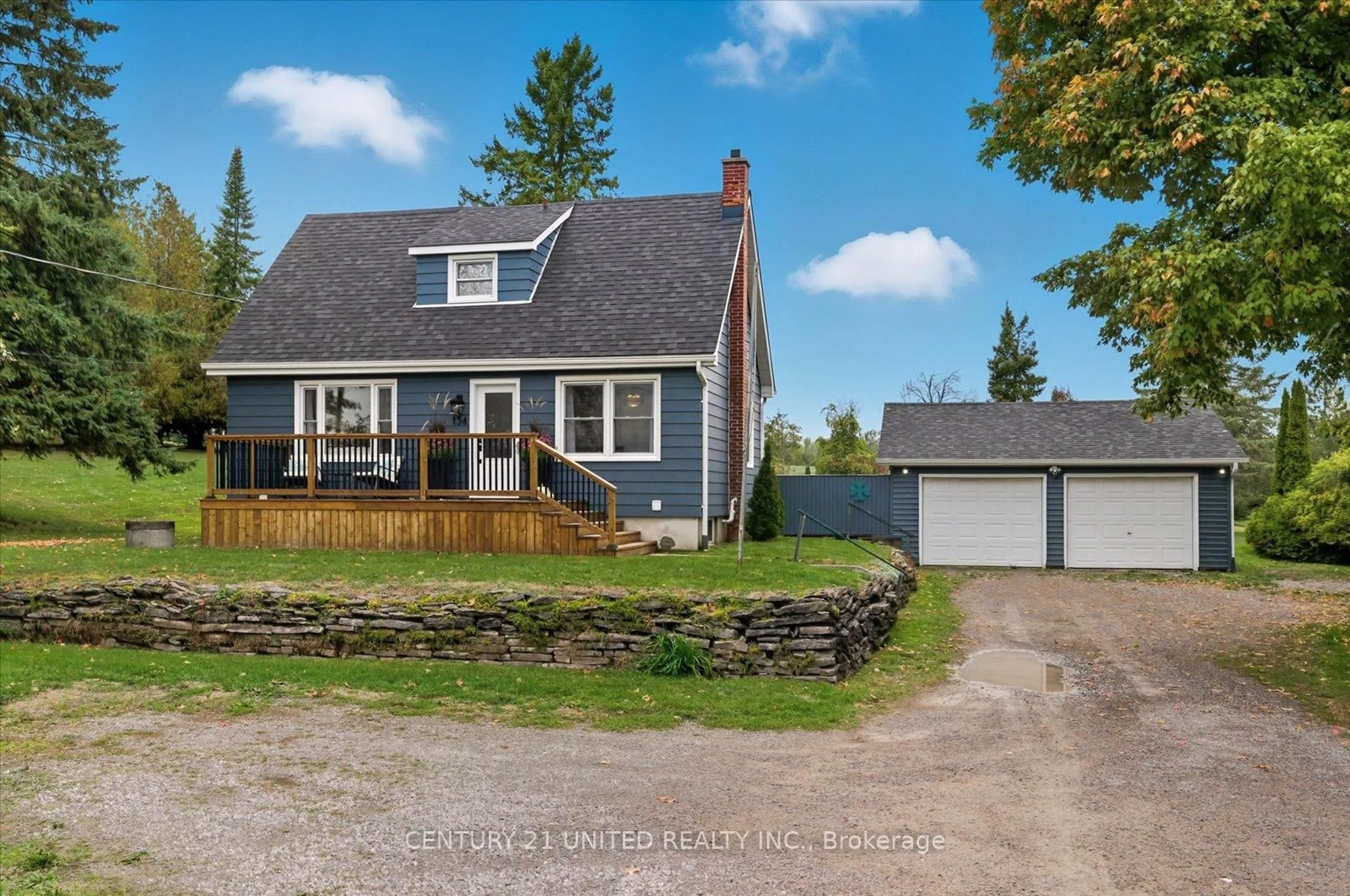A pic from outside/outdoor area/front of a property/back of a property/a pic from drone, street for 154 County Rd 4, Douro-Dummer Ontario K9J 6Y1