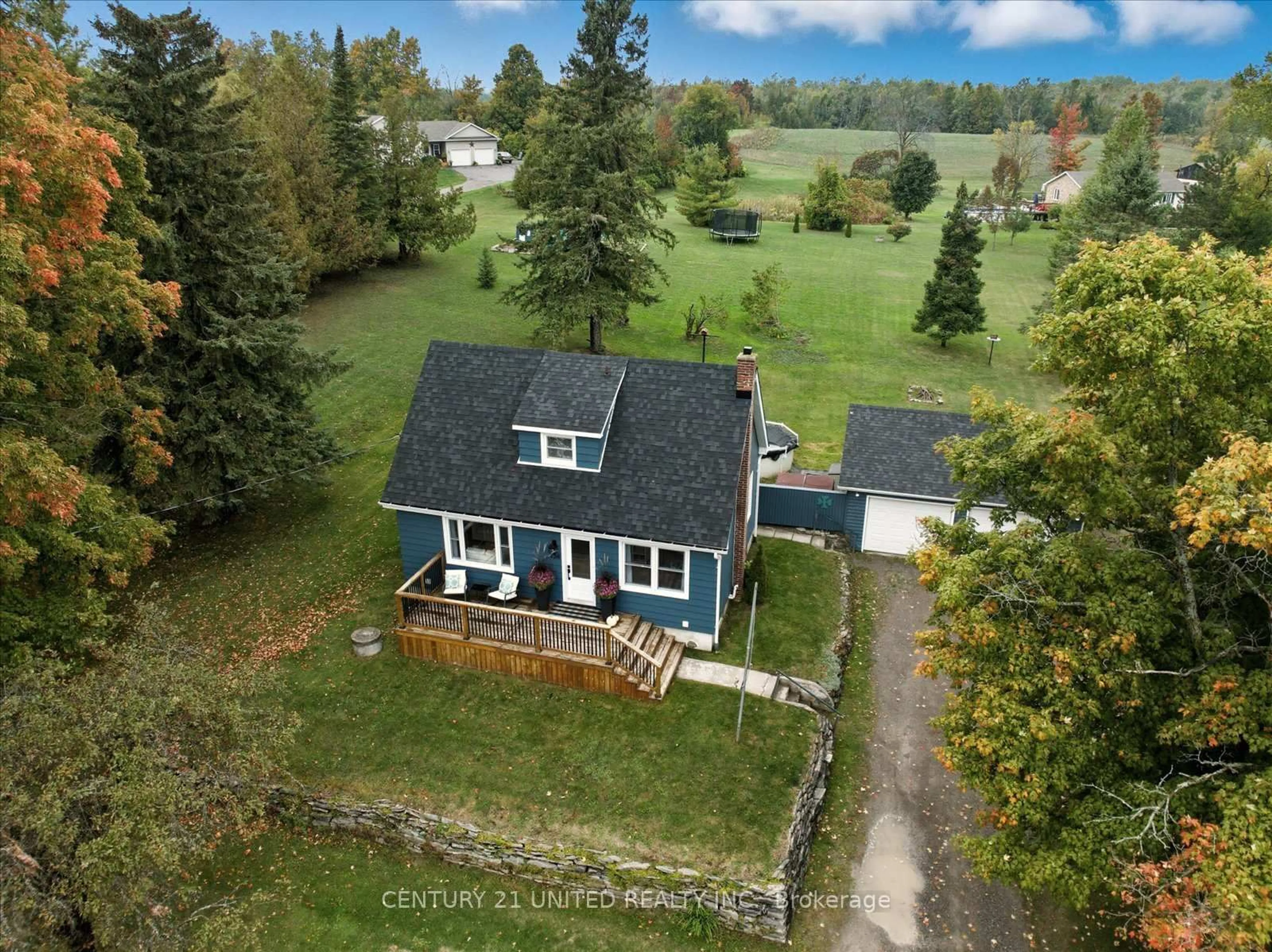 A pic from outside/outdoor area/front of a property/back of a property/a pic from drone, street for 154 County Rd 4, Douro-Dummer Ontario K9J 6Y1