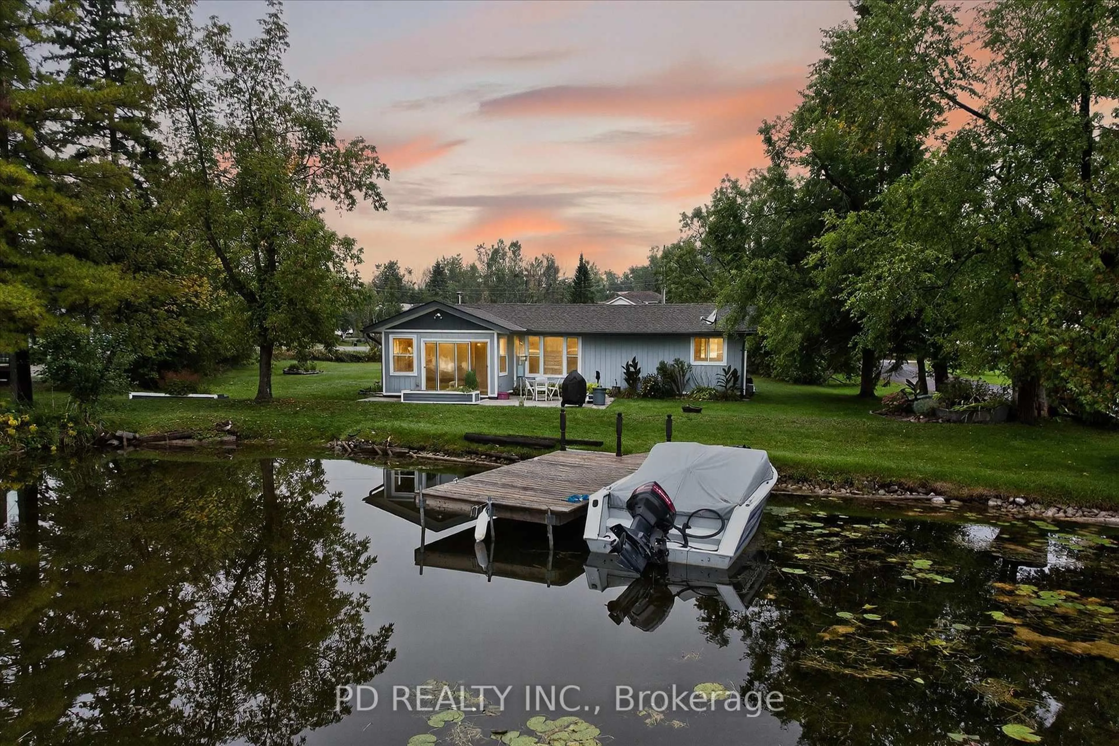 A pic from outside/outdoor area/front of a property/back of a property/a pic from drone, water/lake/river/ocean view for 11 Charlotte Cres, Kawartha Lakes Ontario K0L 2W0