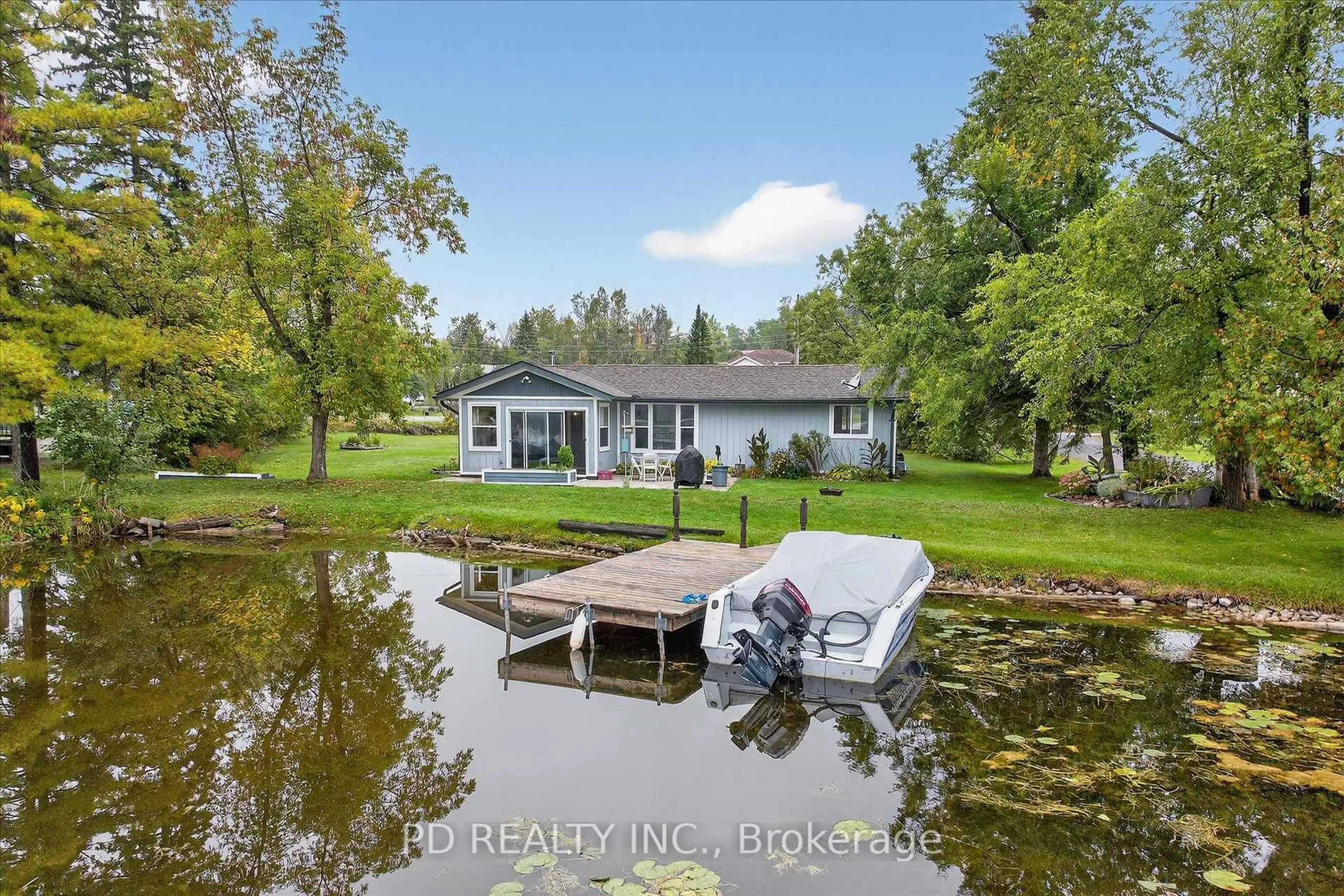 A pic from outside/outdoor area/front of a property/back of a property/a pic from drone, water/lake/river/ocean view for 11 Charlotte Cres, Kawartha Lakes Ontario K0L 2W0