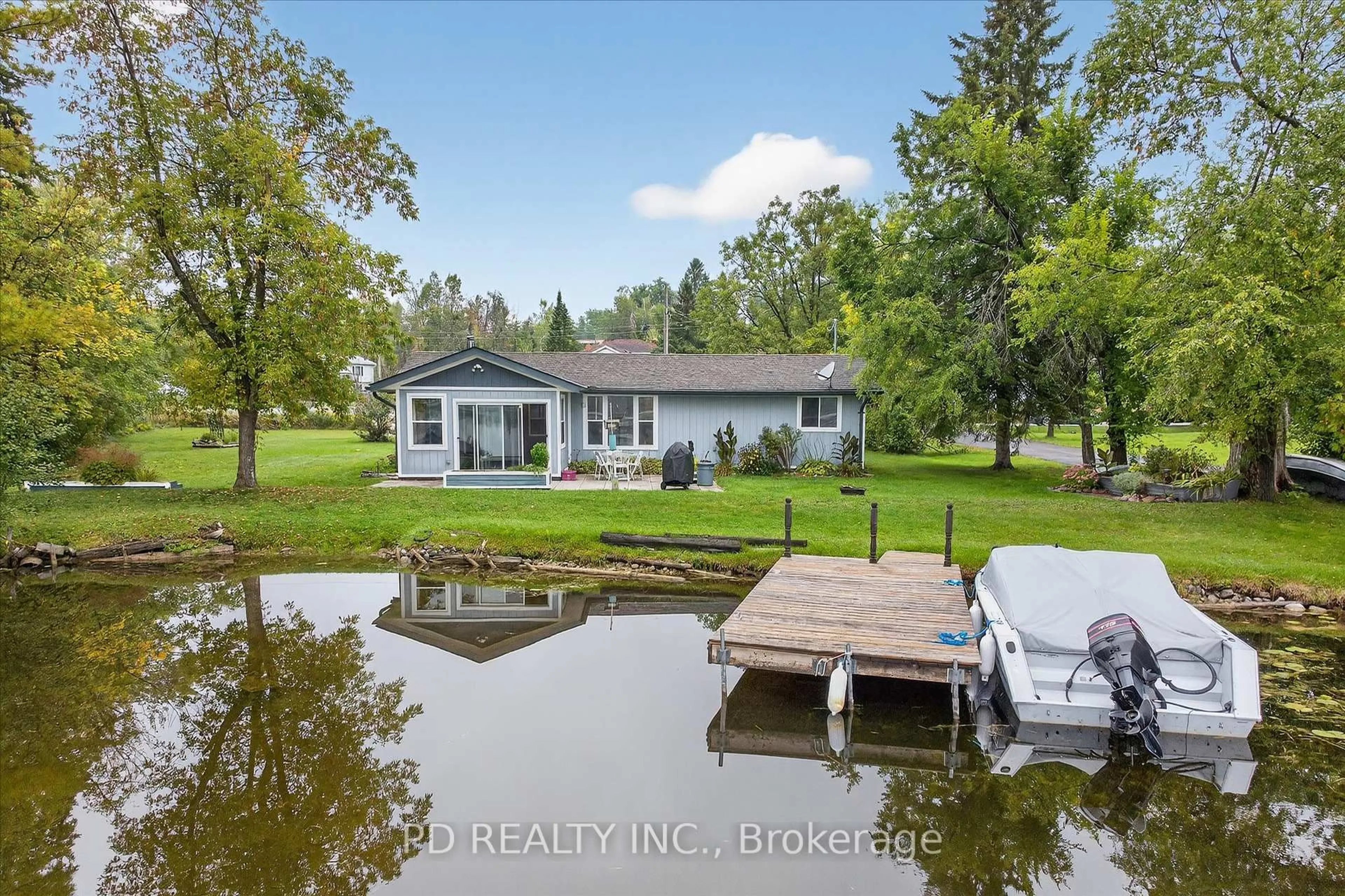 A pic from outside/outdoor area/front of a property/back of a property/a pic from drone, water/lake/river/ocean view for 11 Charlotte Cres, Kawartha Lakes Ontario K0L 2W0