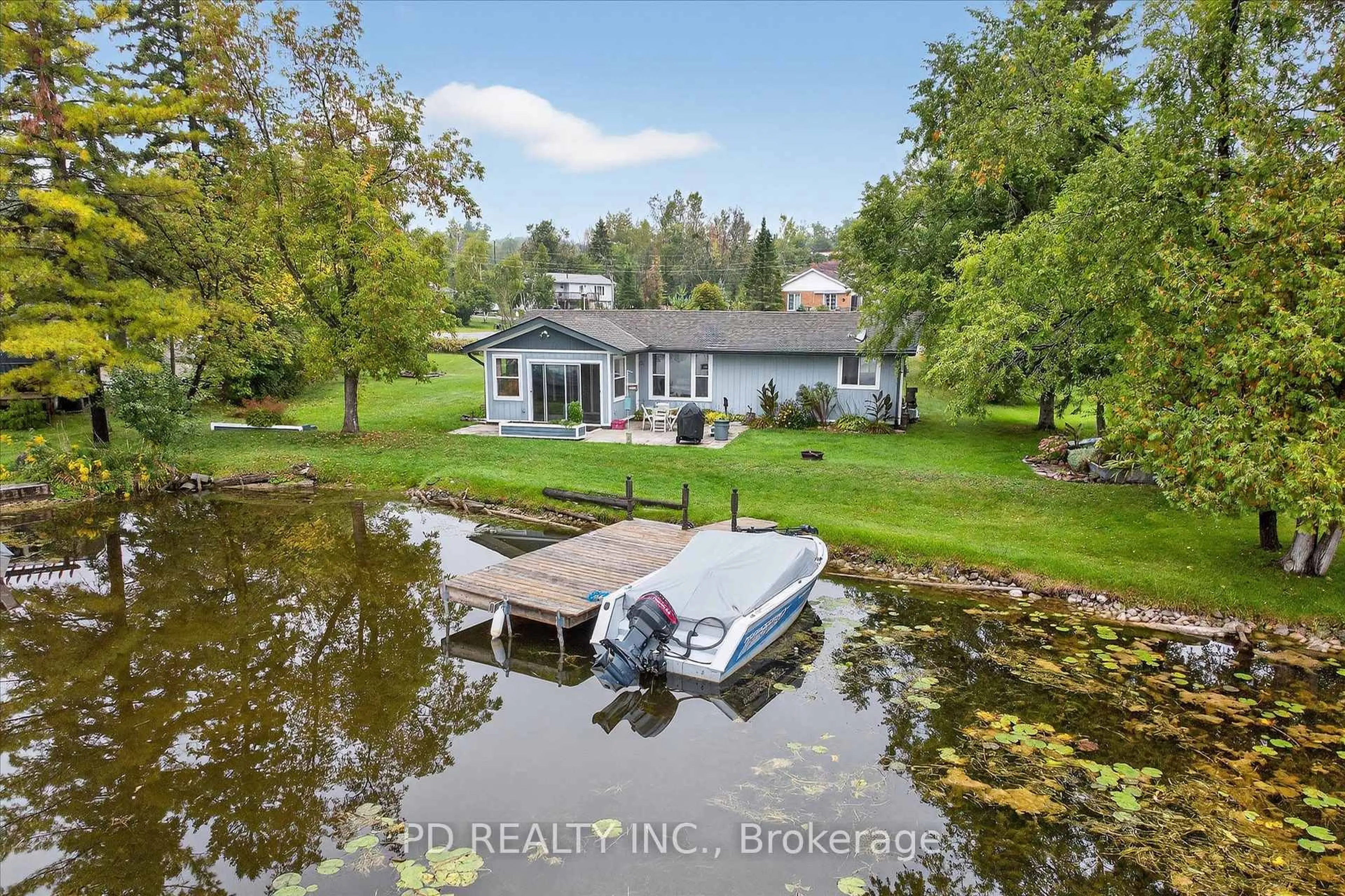 A pic from outside/outdoor area/front of a property/back of a property/a pic from drone, water/lake/river/ocean view for 11 Charlotte Cres, Kawartha Lakes Ontario K0L 2W0