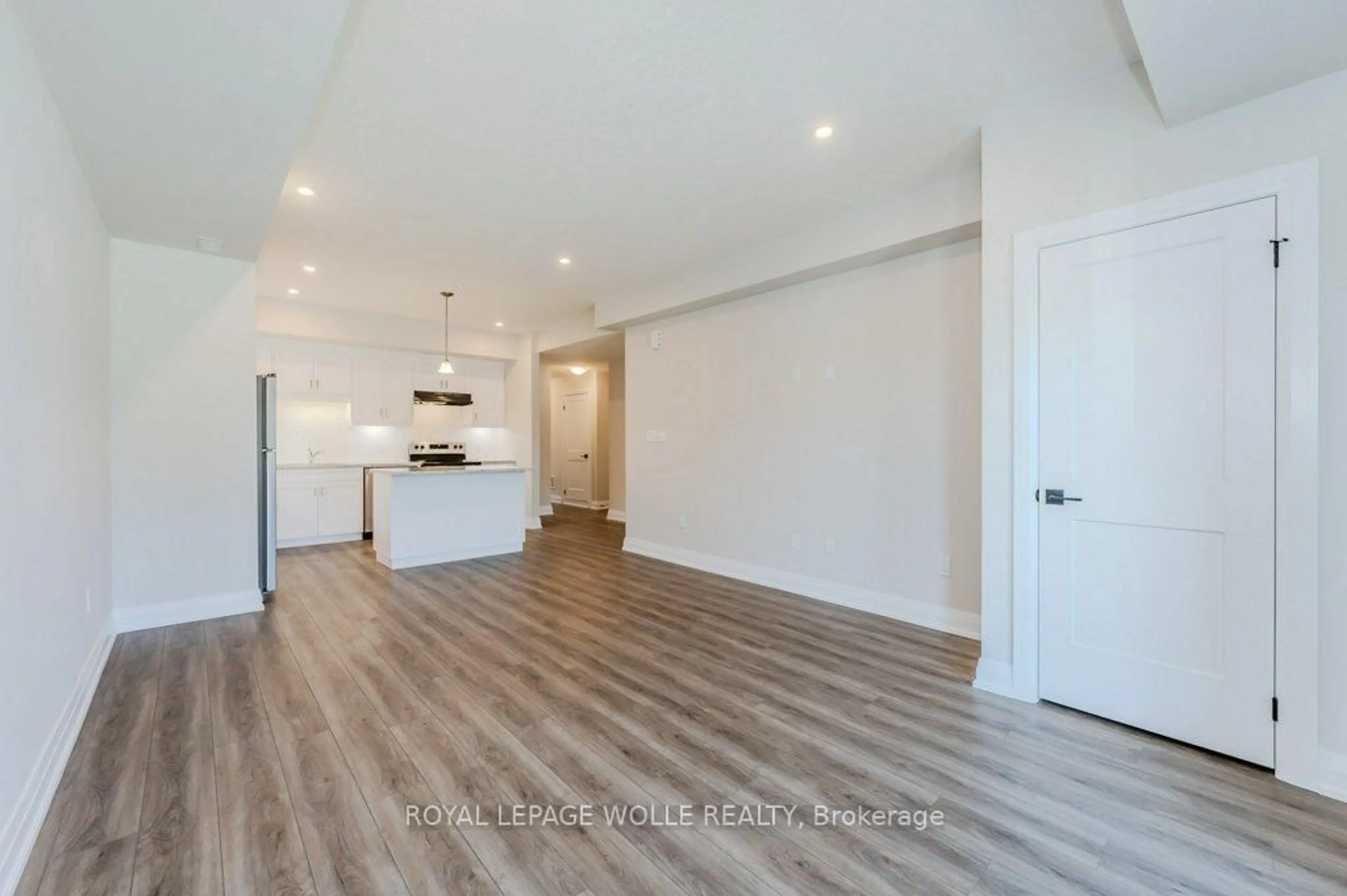 Open concept kitchen, wood/laminate floor for 261 Woodbine Ave #24, Kitchener Ontario N2R 0S7