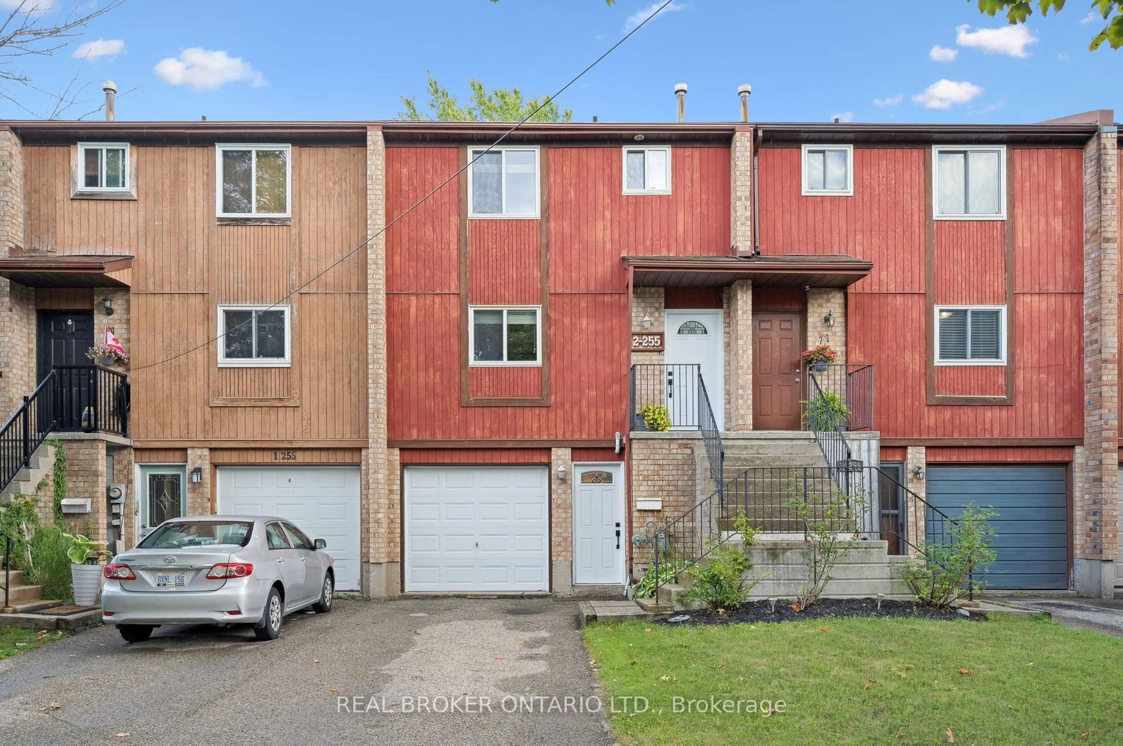 A pic from outside/outdoor area/front of a property/back of a property/a pic from drone, street for 255 Camelot Crt #2, Waterloo Ontario N2K 3G1