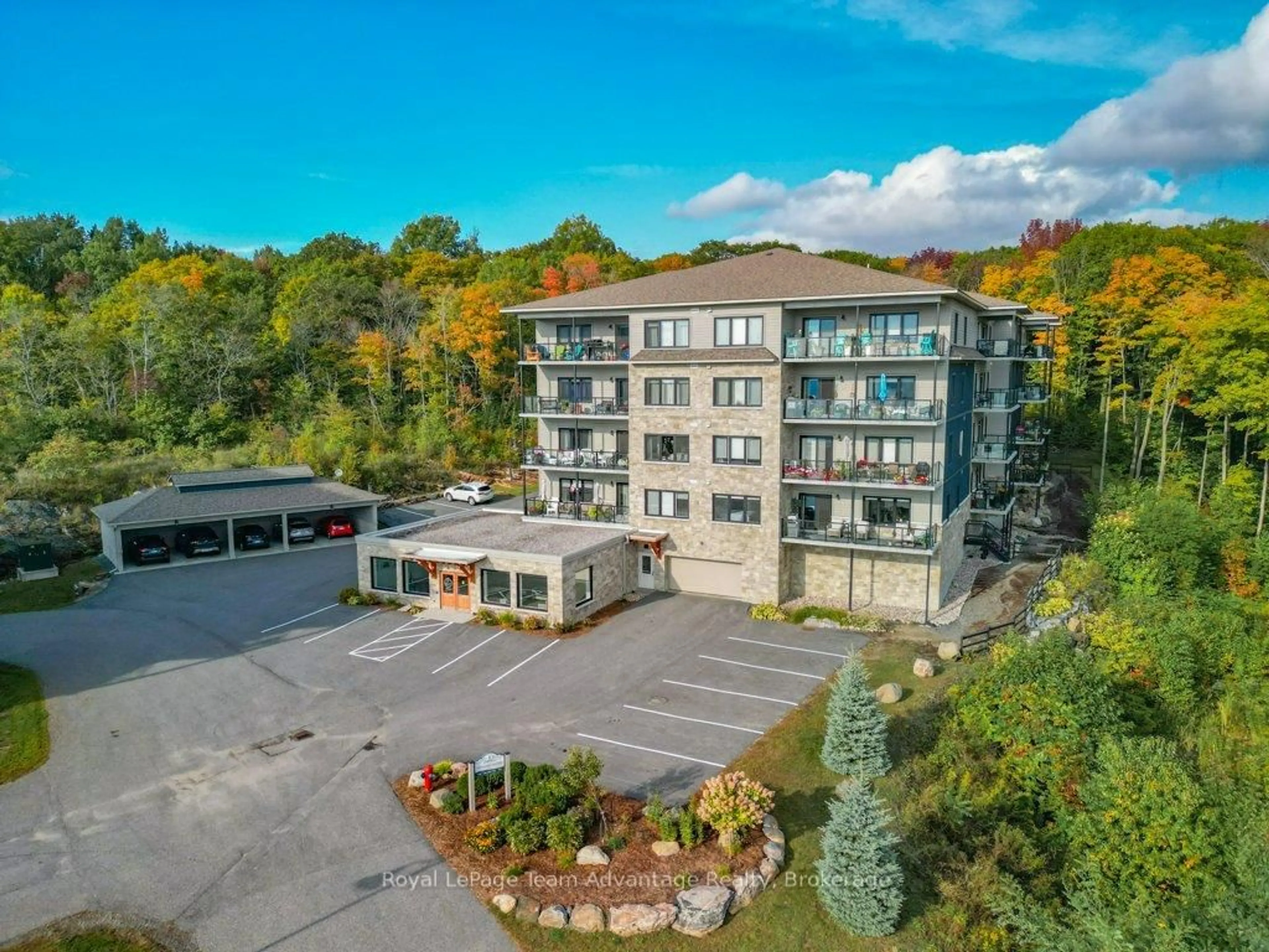 A pic from outside/outdoor area/front of a property/back of a property/a pic from drone, unknown for 11B Salt Dock Rd #103, Parry Sound Ontario P2A 3B6