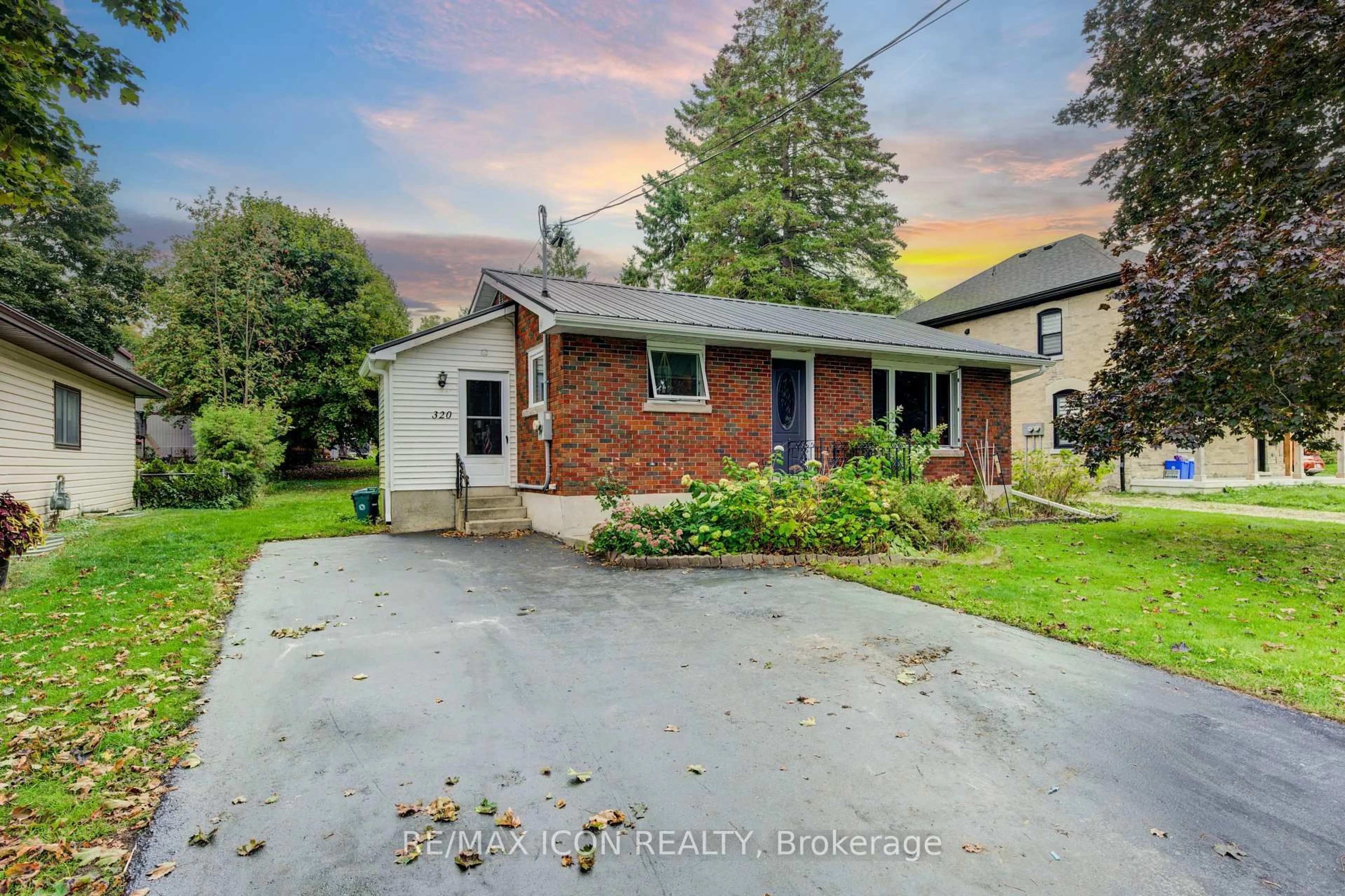 A pic from outside/outdoor area/front of a property/back of a property/a pic from drone, street for 320 William St, Wellington North Ontario N0G 2L3