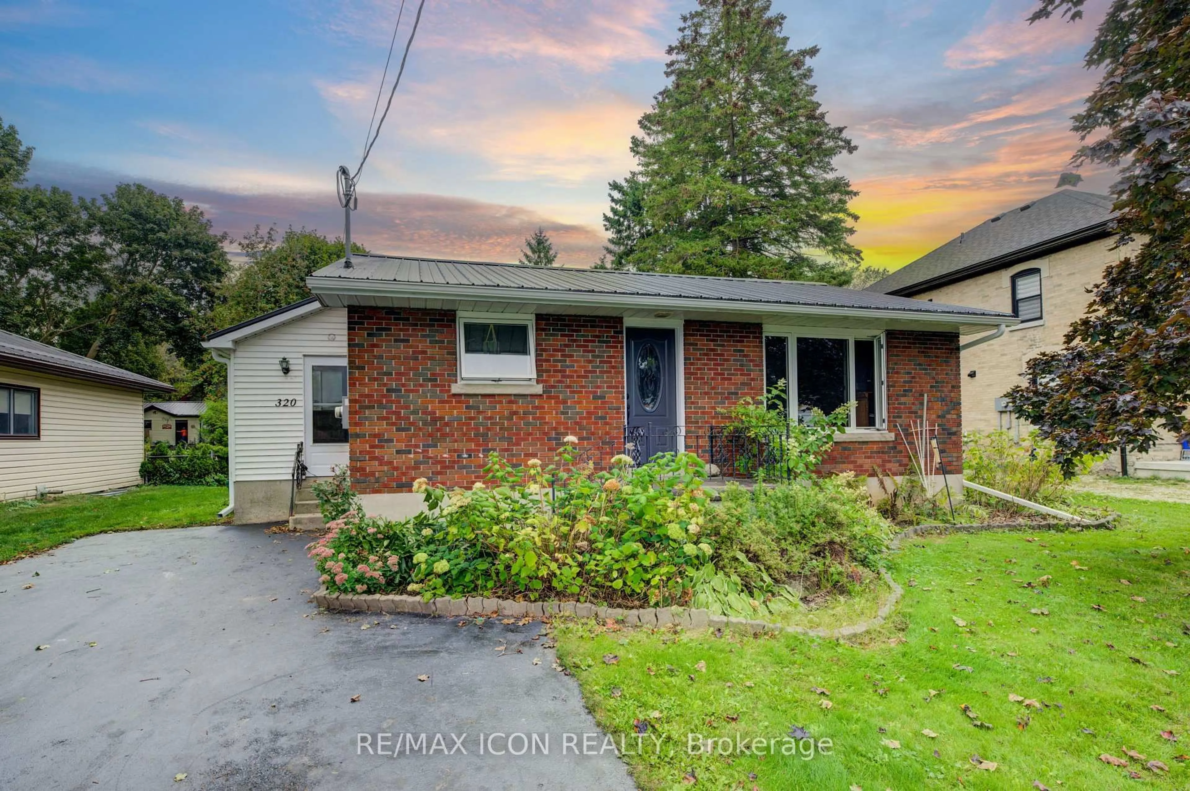 Home with brick exterior material, street for 320 William St, Wellington North Ontario N0G 2L3