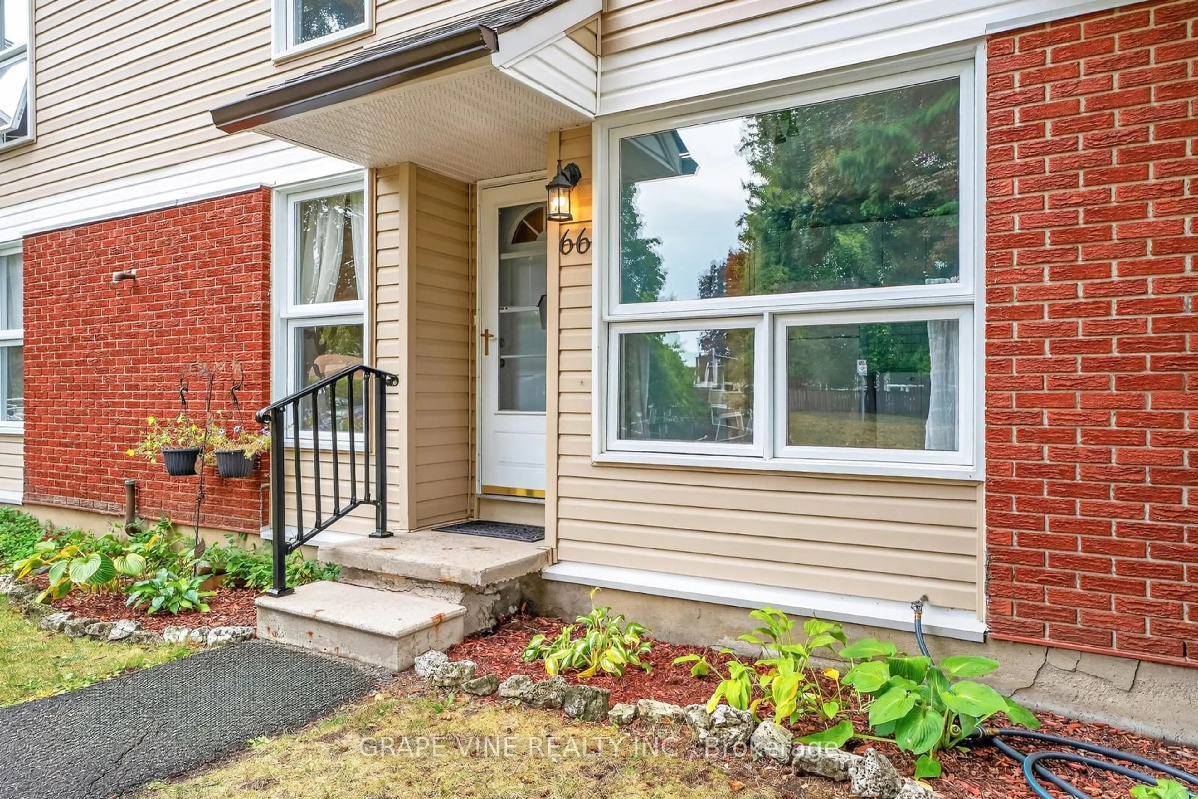 Home with brick exterior material, street for 66 Rutherford Way, Ottawa Ontario K2K 1N4