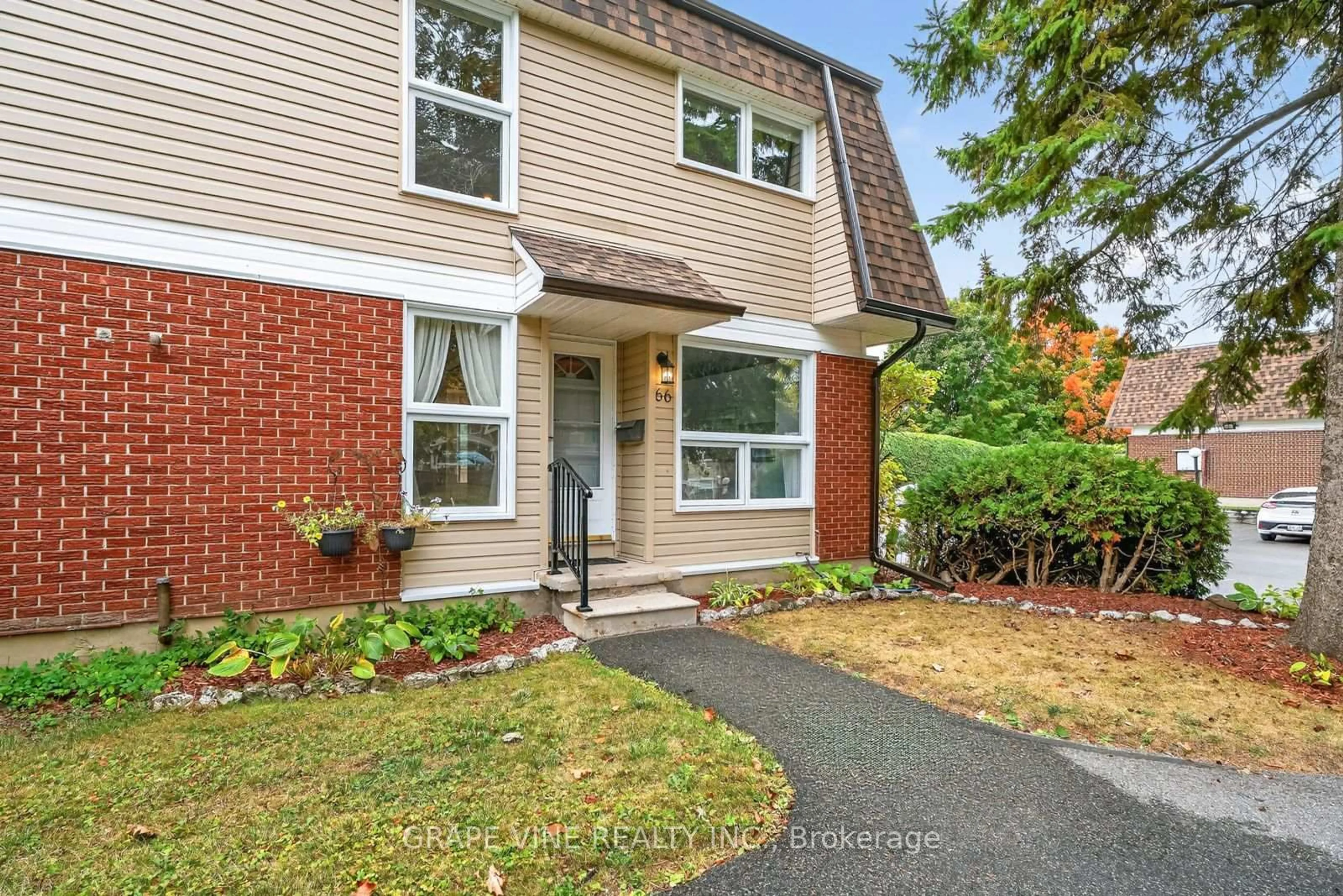 Home with brick exterior material, street for 66 Rutherford Way, Ottawa Ontario K2K 1N4