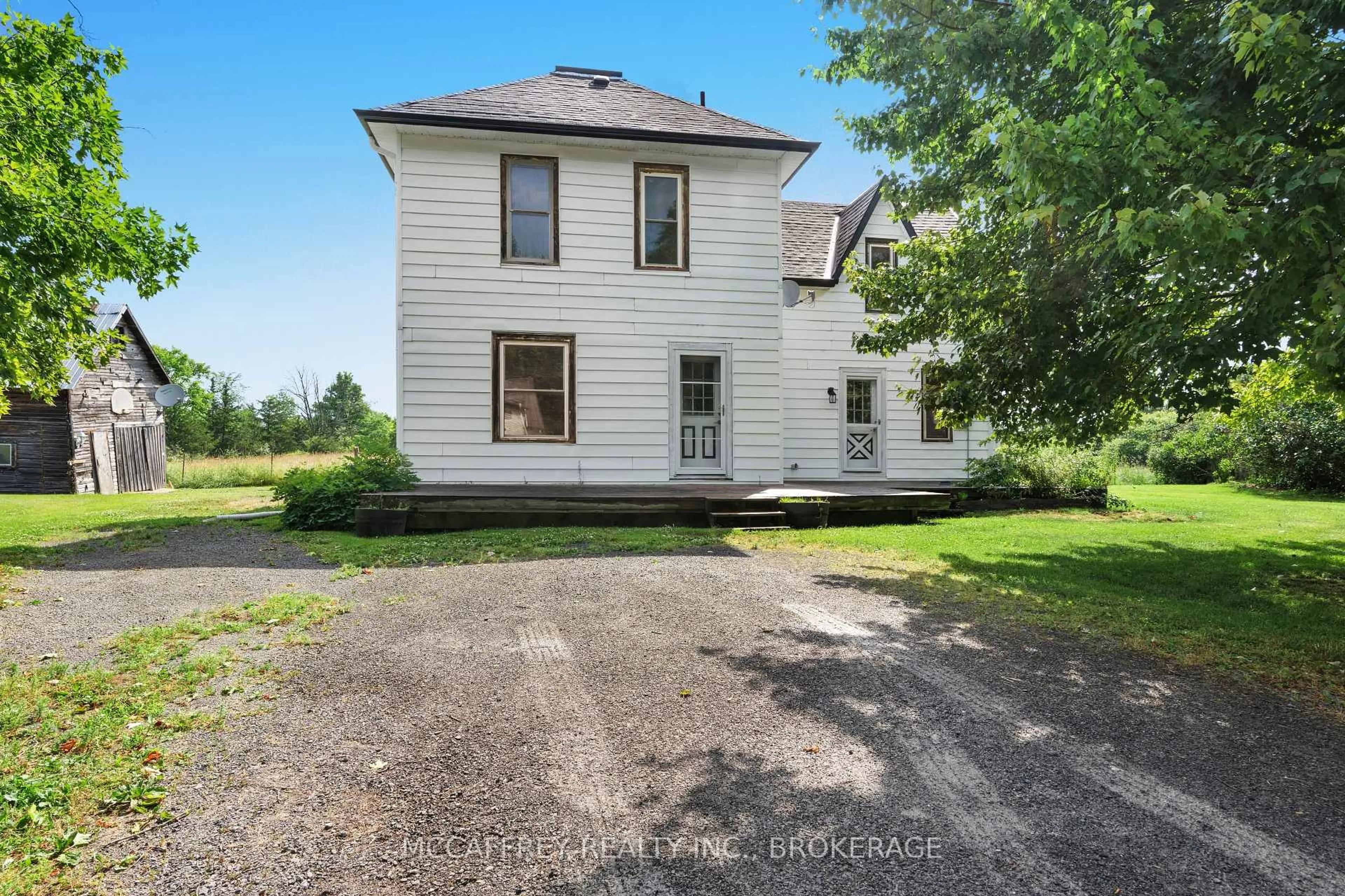 A pic from outside/outdoor area/front of a property/back of a property/a pic from drone, street for 338 Burridge Rd, Godfrey Ontario K0H 1T0
