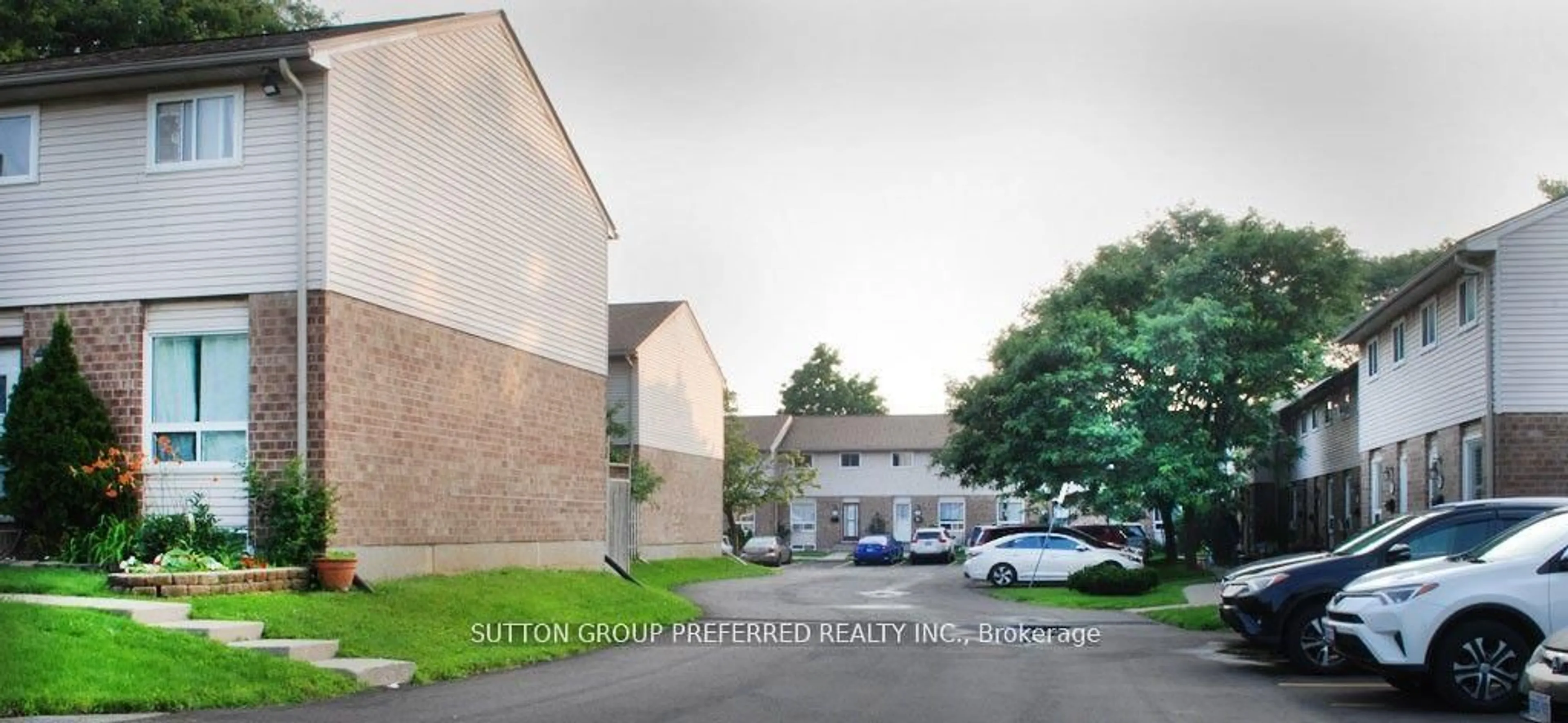 A pic from outside/outdoor area/front of a property/back of a property/a pic from drone, street for 311 Vesta Rd #6, London East Ontario N5Y 5J1