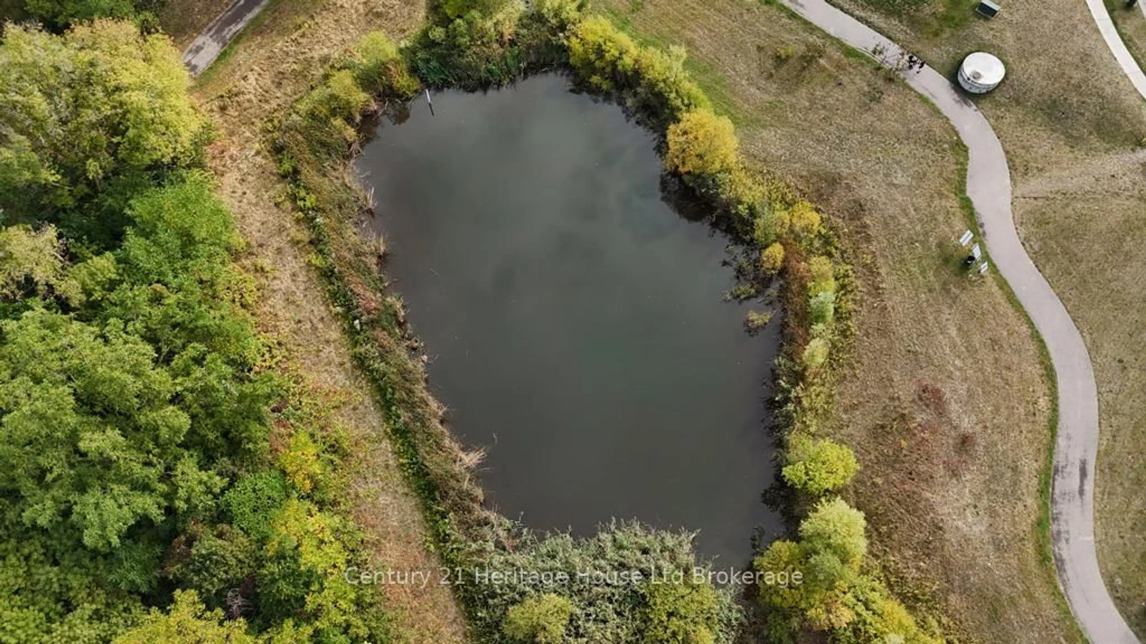 A pic from outside/outdoor area/front of a property/back of a property/a pic from drone, water/lake/river/ocean view for 35 Chatfield St #3, Ingersoll Ontario N5C 0B3