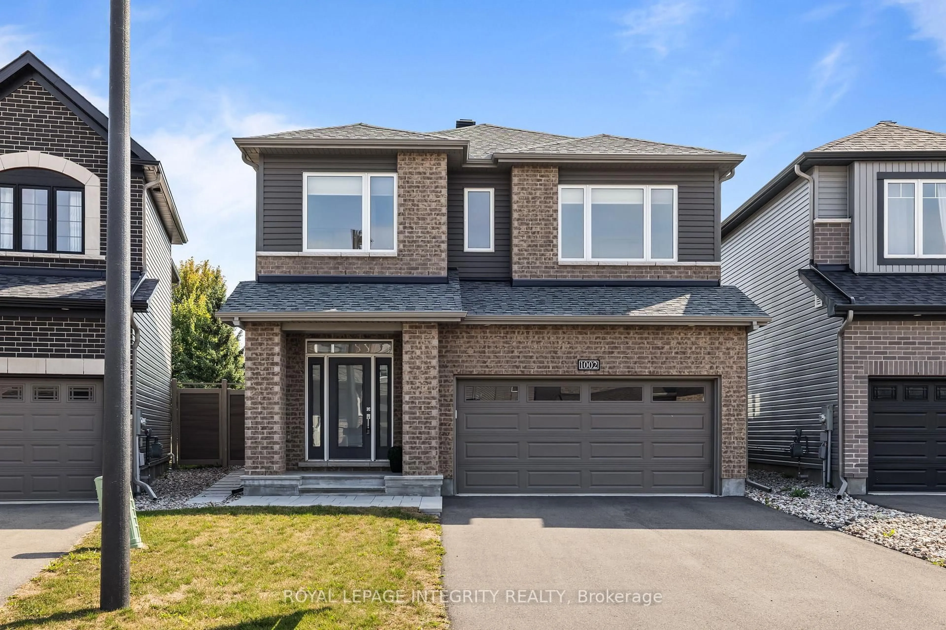Home with brick exterior material, street for 1002 Jubilation Crt, Ottawa Ontario K4A 5K5