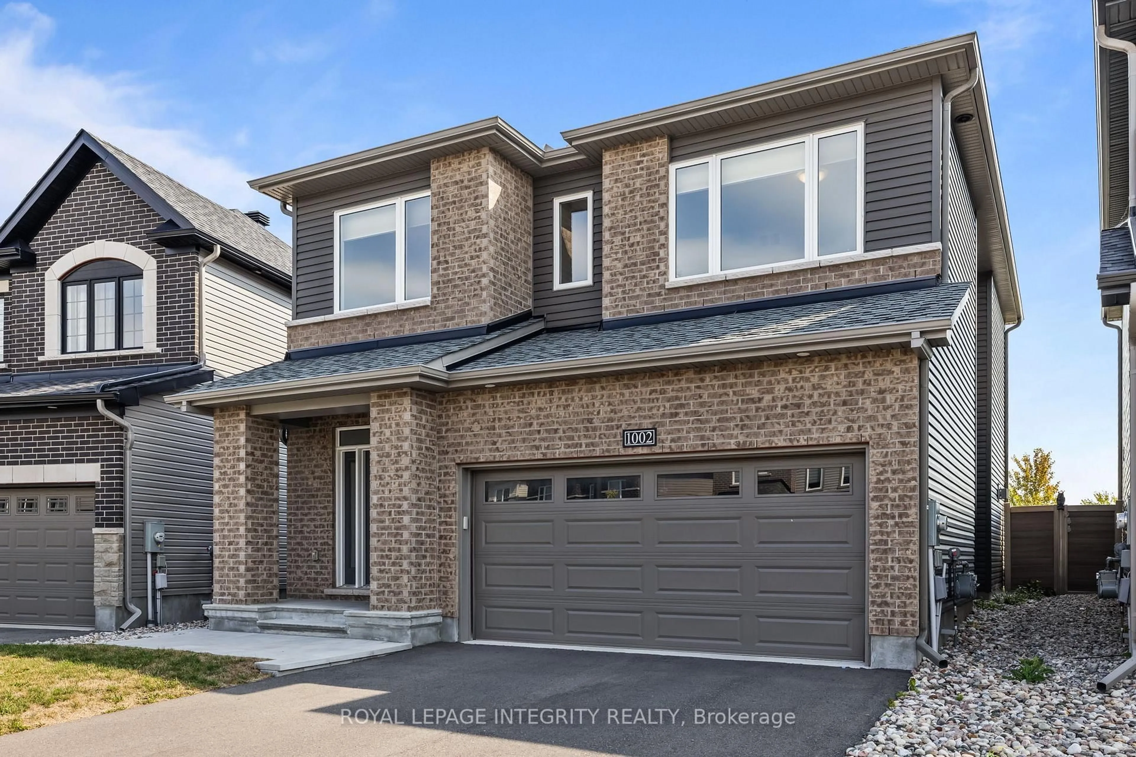 Home with brick exterior material, street for 1002 Jubilation Crt, Ottawa Ontario K4A 5K5