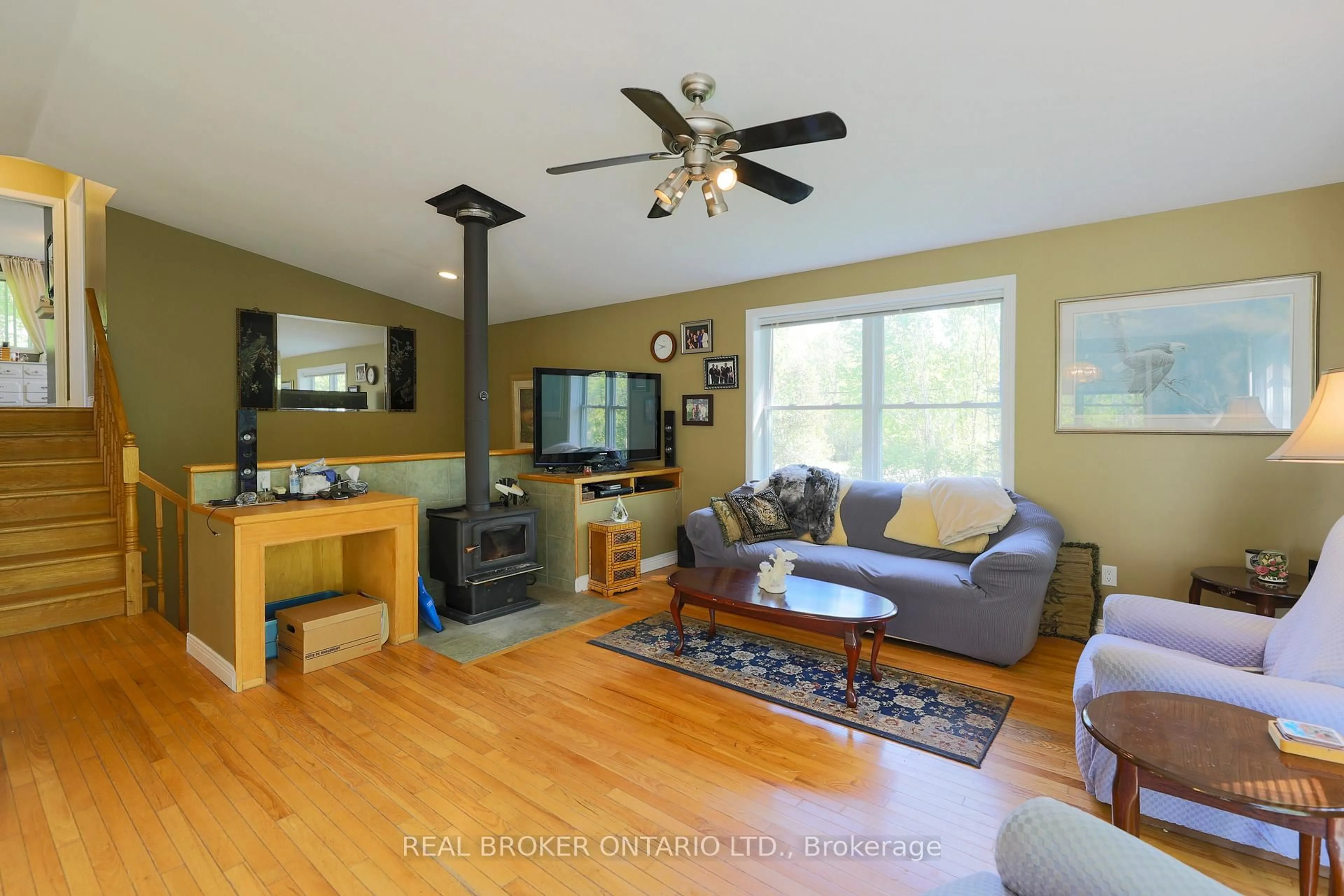 Living room with furniture, wood/laminate floor for 988 County 44 Rd, North Grenville Ontario K0G 1T0