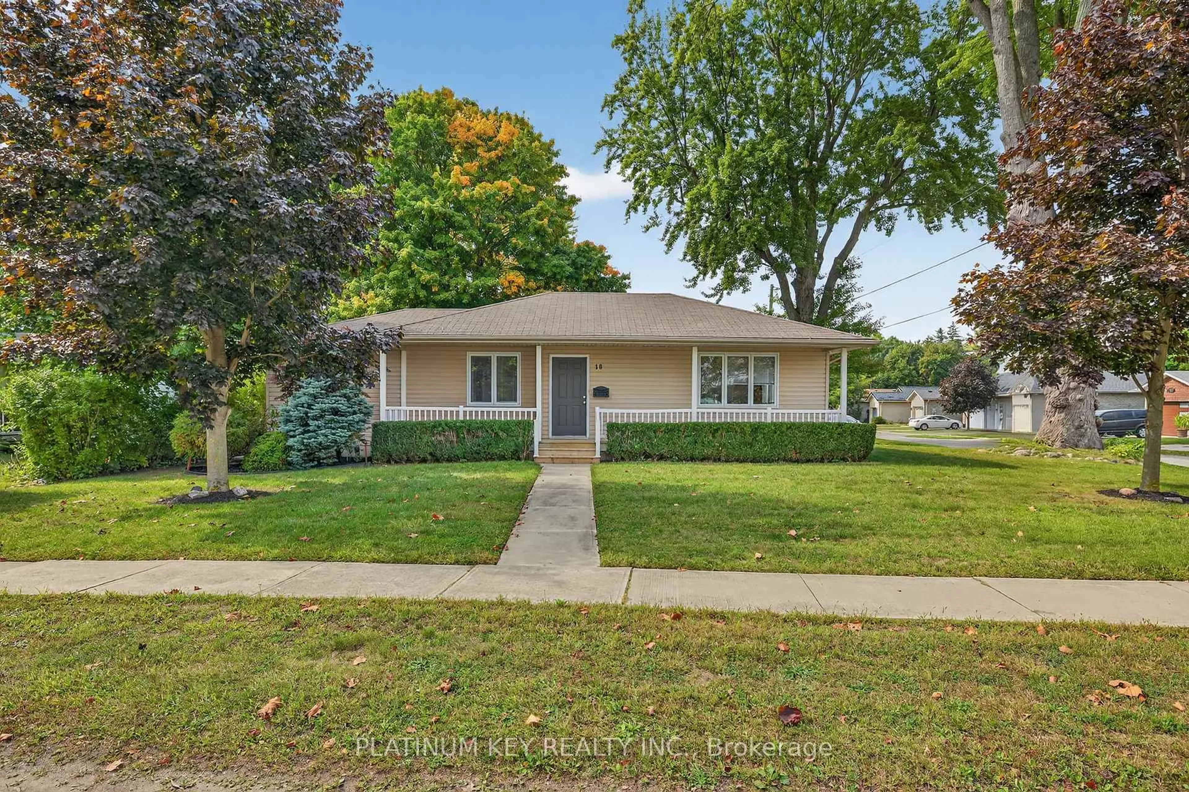 Home with vinyl exterior material, street for 18 Richmond St, Strathroy-Caradoc Ontario N7G 2Y8