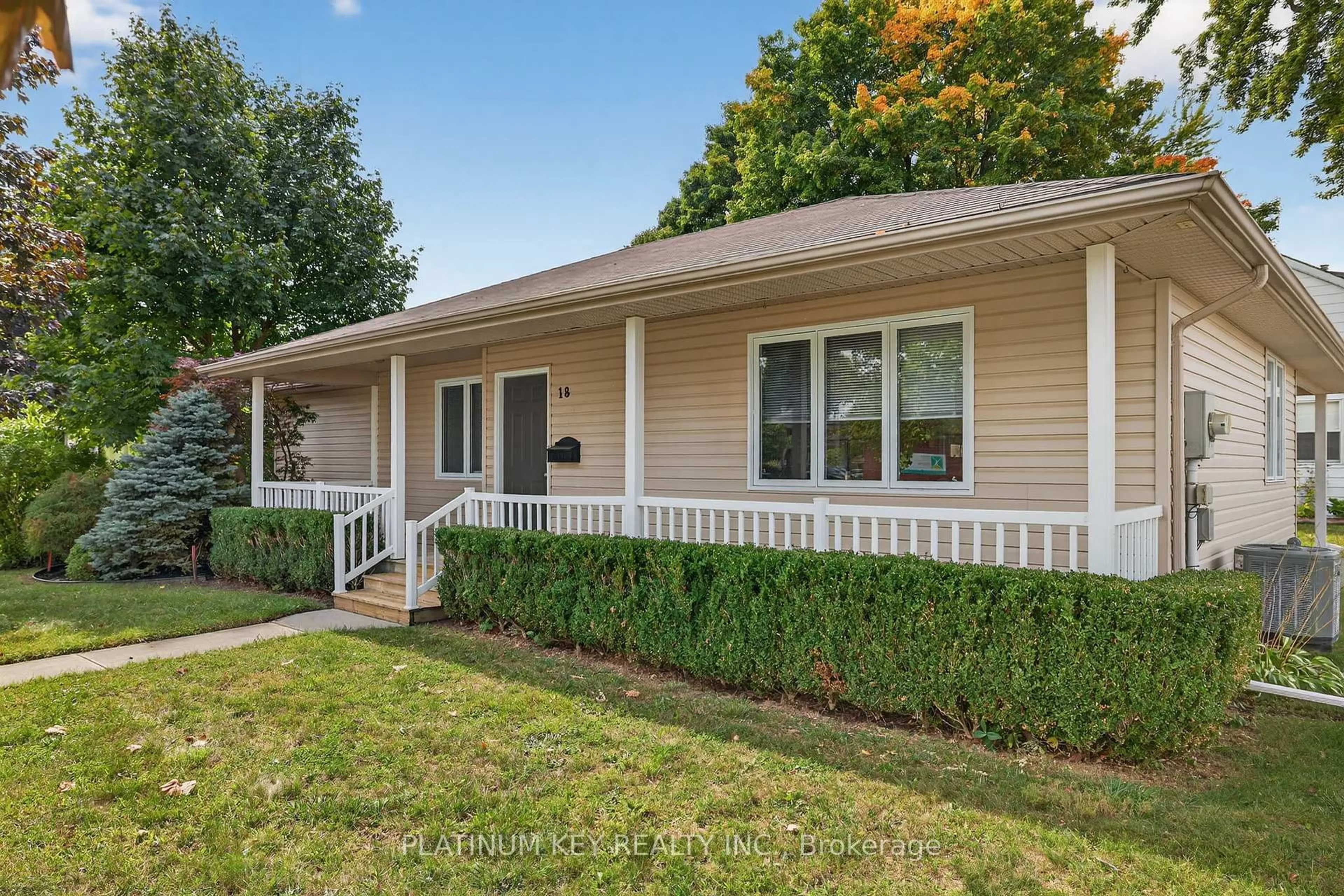 Home with vinyl exterior material, street for 18 Richmond St, Strathroy-Caradoc Ontario N7G 2Y8
