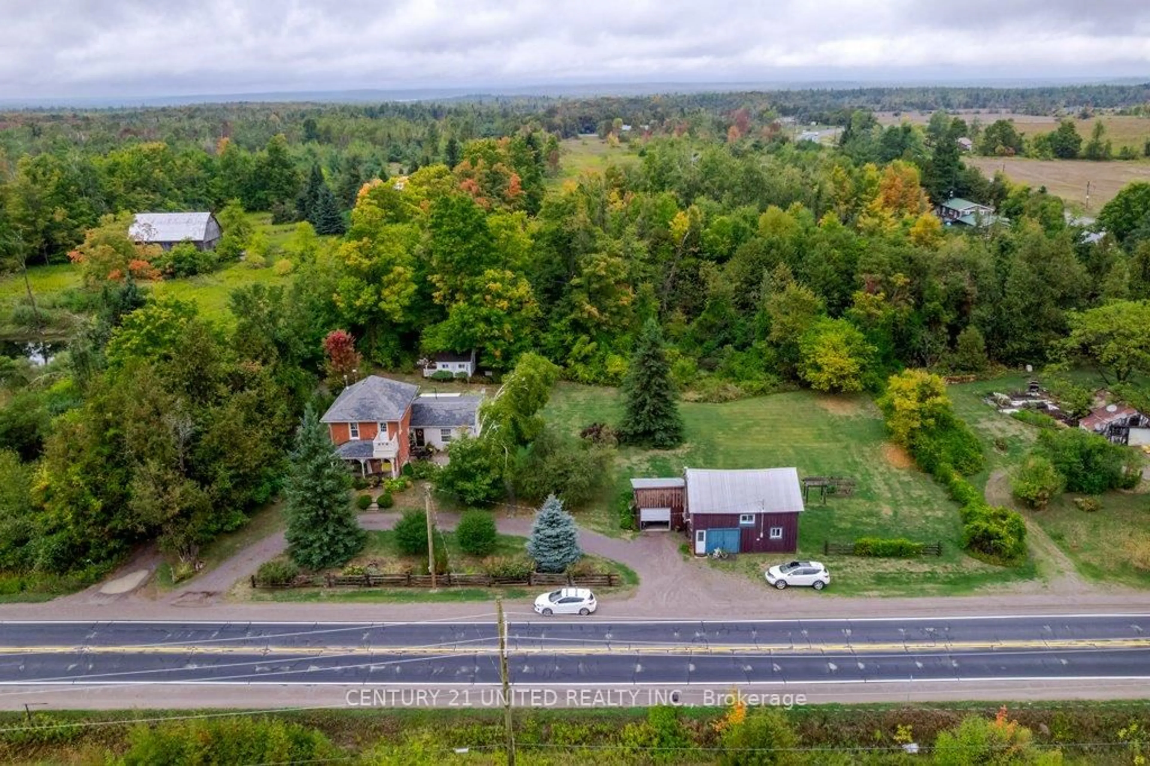 A pic from outside/outdoor area/front of a property/back of a property/a pic from drone, unknown for 1920 County Rd 6, Douro-Dummer Ontario K0L 2H0