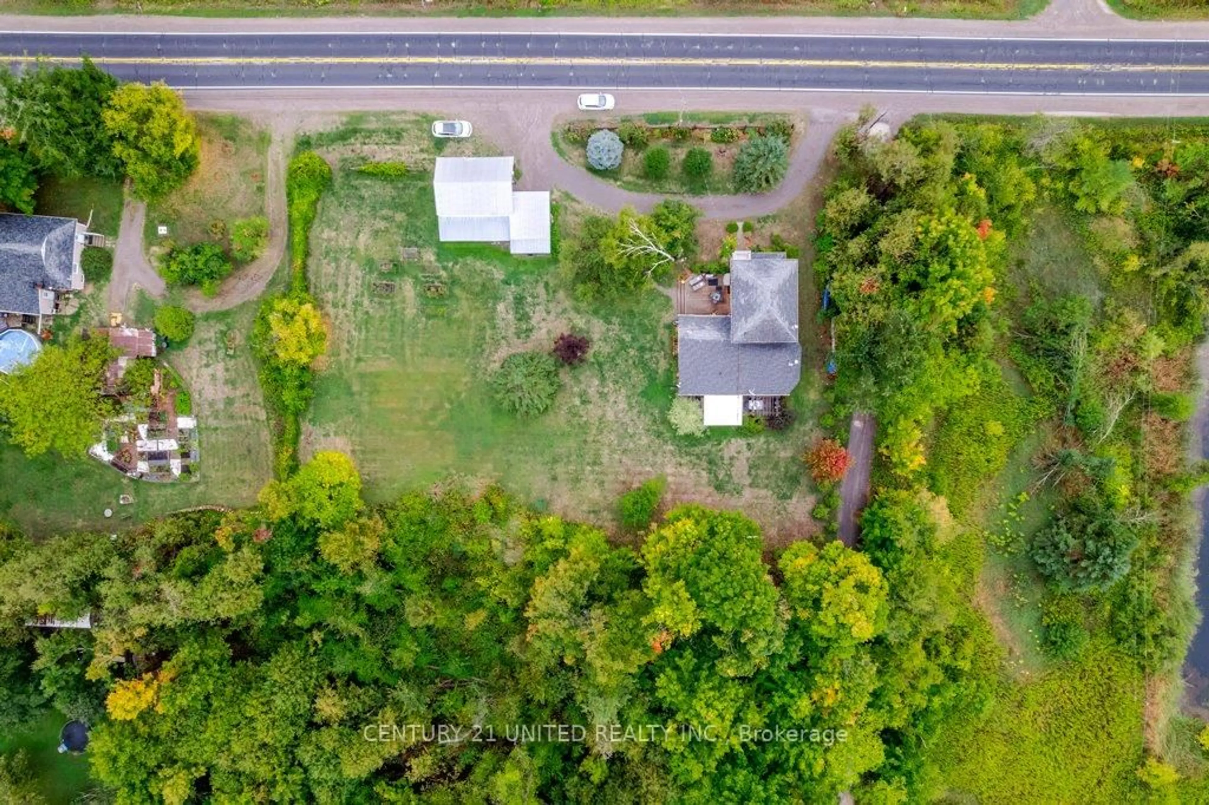 A pic from outside/outdoor area/front of a property/back of a property/a pic from drone, street for 1920 County Rd 6, Douro-Dummer Ontario K0L 2H0