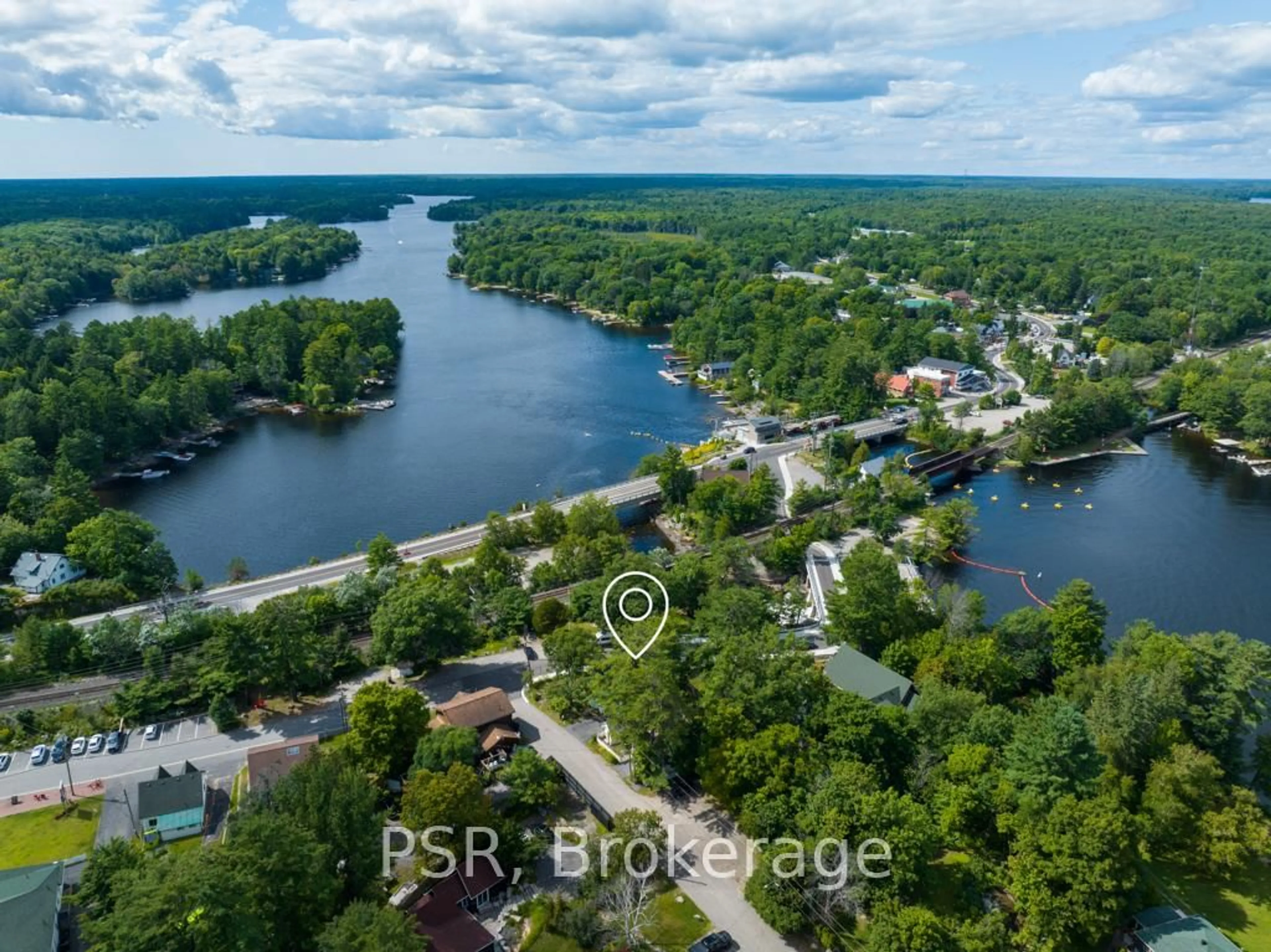A pic from outside/outdoor area/front of a property/back of a property/a pic from drone, water/lake/river/ocean view for 1020 Bala Falls Rd, Muskoka Lakes Ontario P0C 1A0