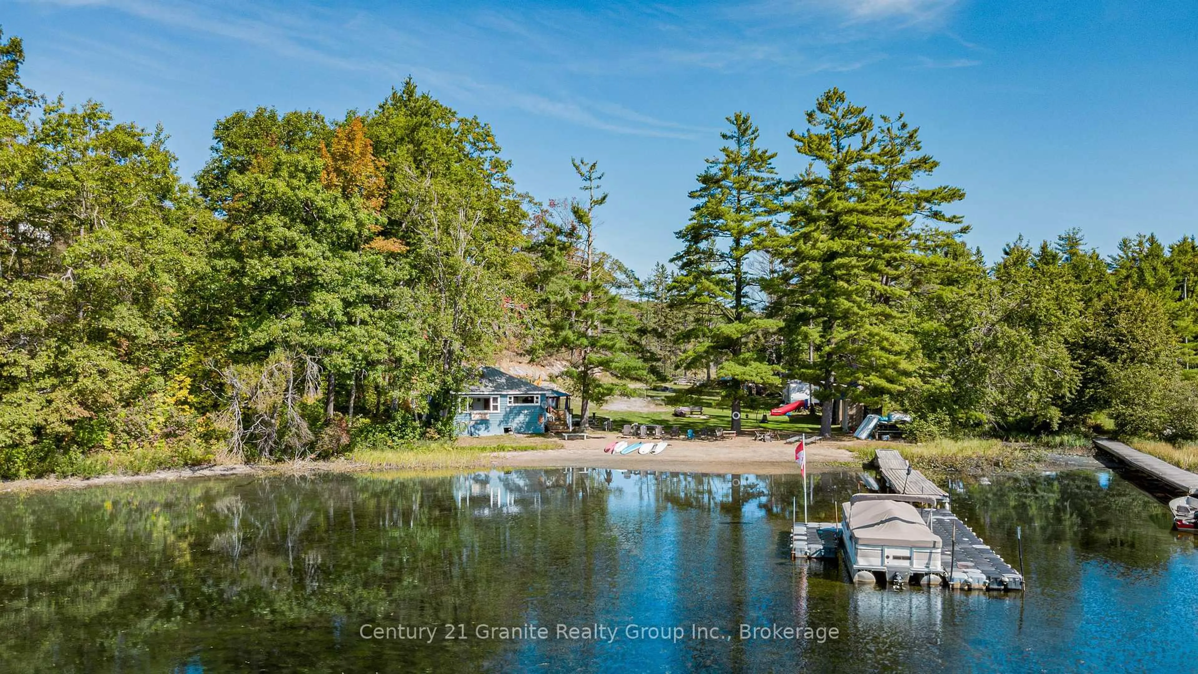 A pic from outside/outdoor area/front of a property/back of a property/a pic from drone, water/lake/river/ocean view for 1230 FORSTERS Rd, Minden Hills Ontario K0M 2K0