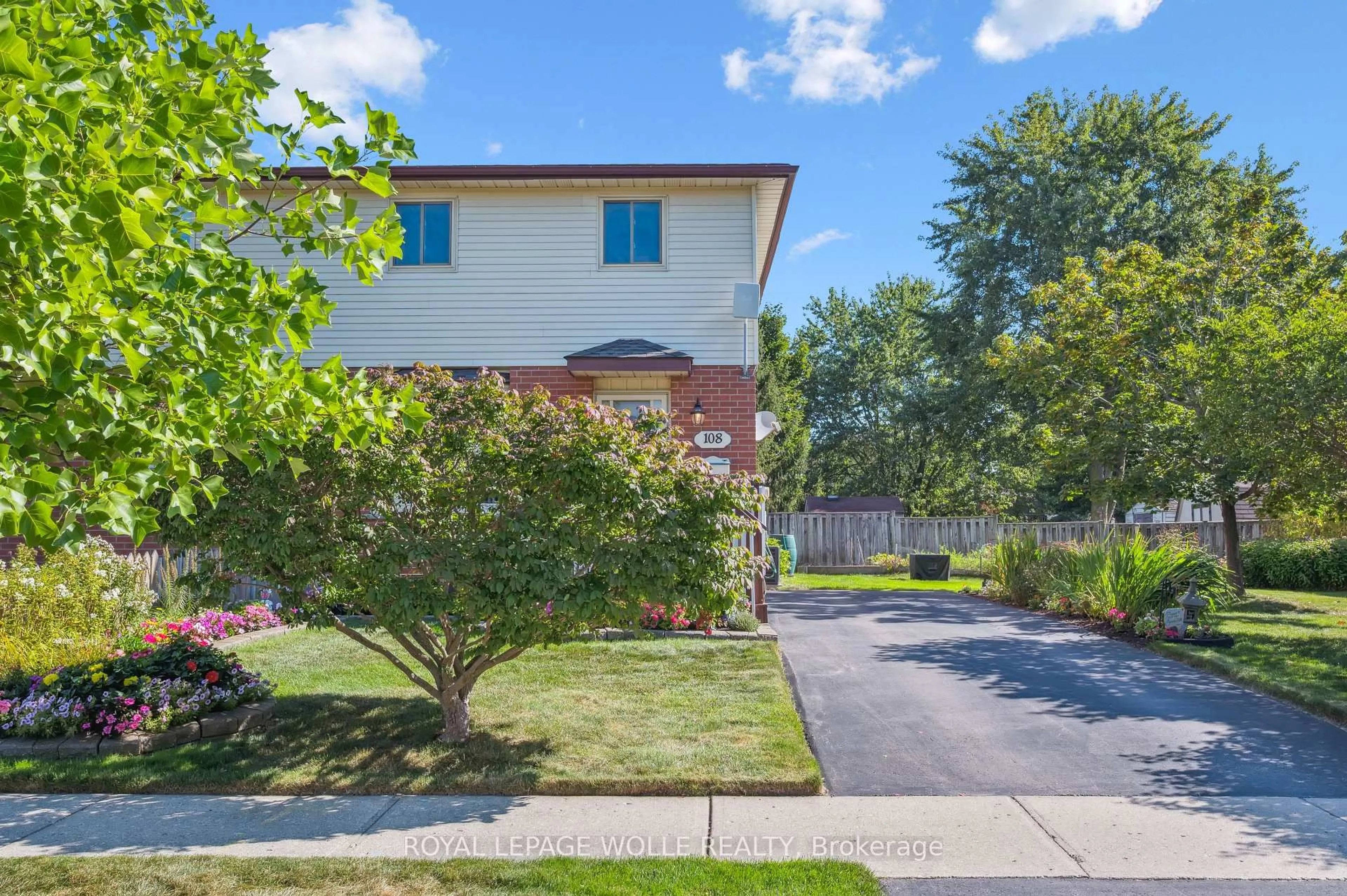 Home with brick exterior material, street for 108 Penelope Dr, Kitchener Ontario N2N 3C7