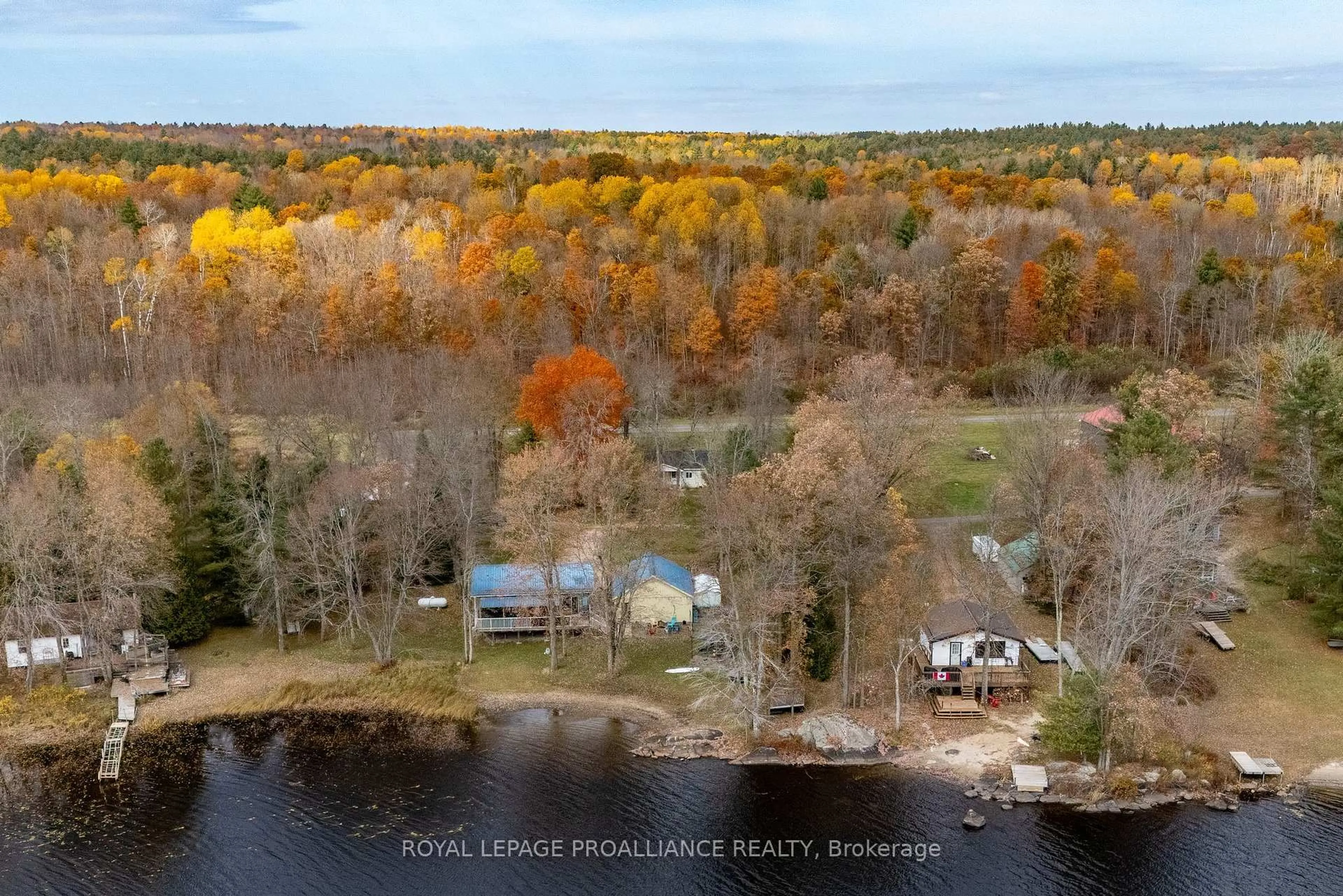 A pic from outside/outdoor area/front of a property/back of a property/a pic from drone, water/lake/river/ocean view for 1019 Turner Way, Arden Ontario K0H 1B0