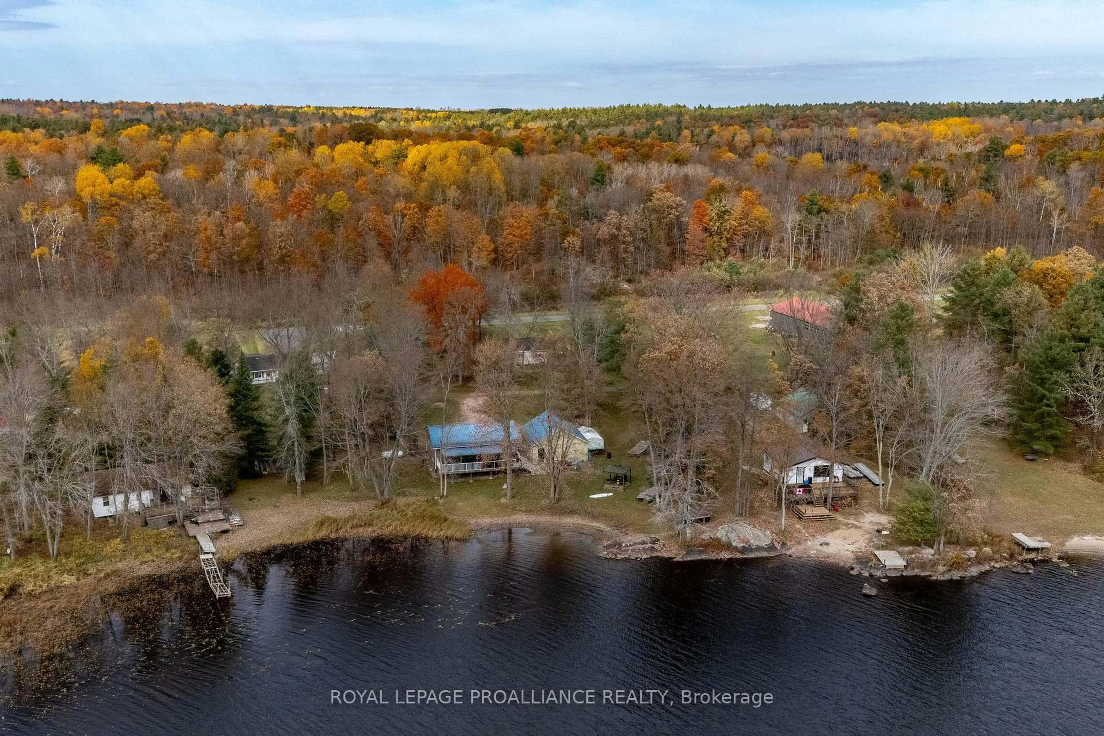 A pic from outside/outdoor area/front of a property/back of a property/a pic from drone, water/lake/river/ocean view for 1019 Turner Way, Arden Ontario K0H 1B0
