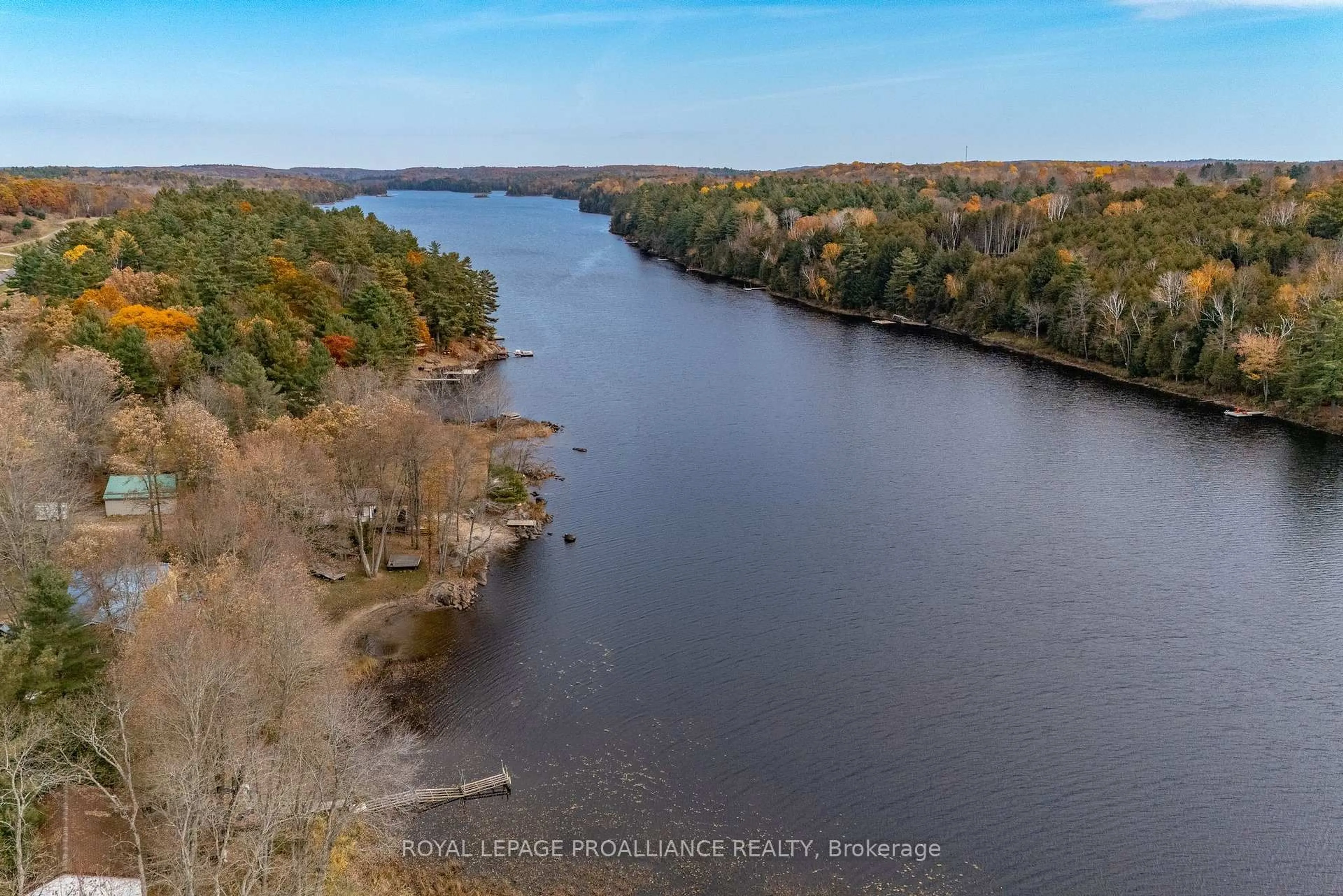 A pic from outside/outdoor area/front of a property/back of a property/a pic from drone, water/lake/river/ocean view for 1019 Turner Way, Arden Ontario K0H 1B0
