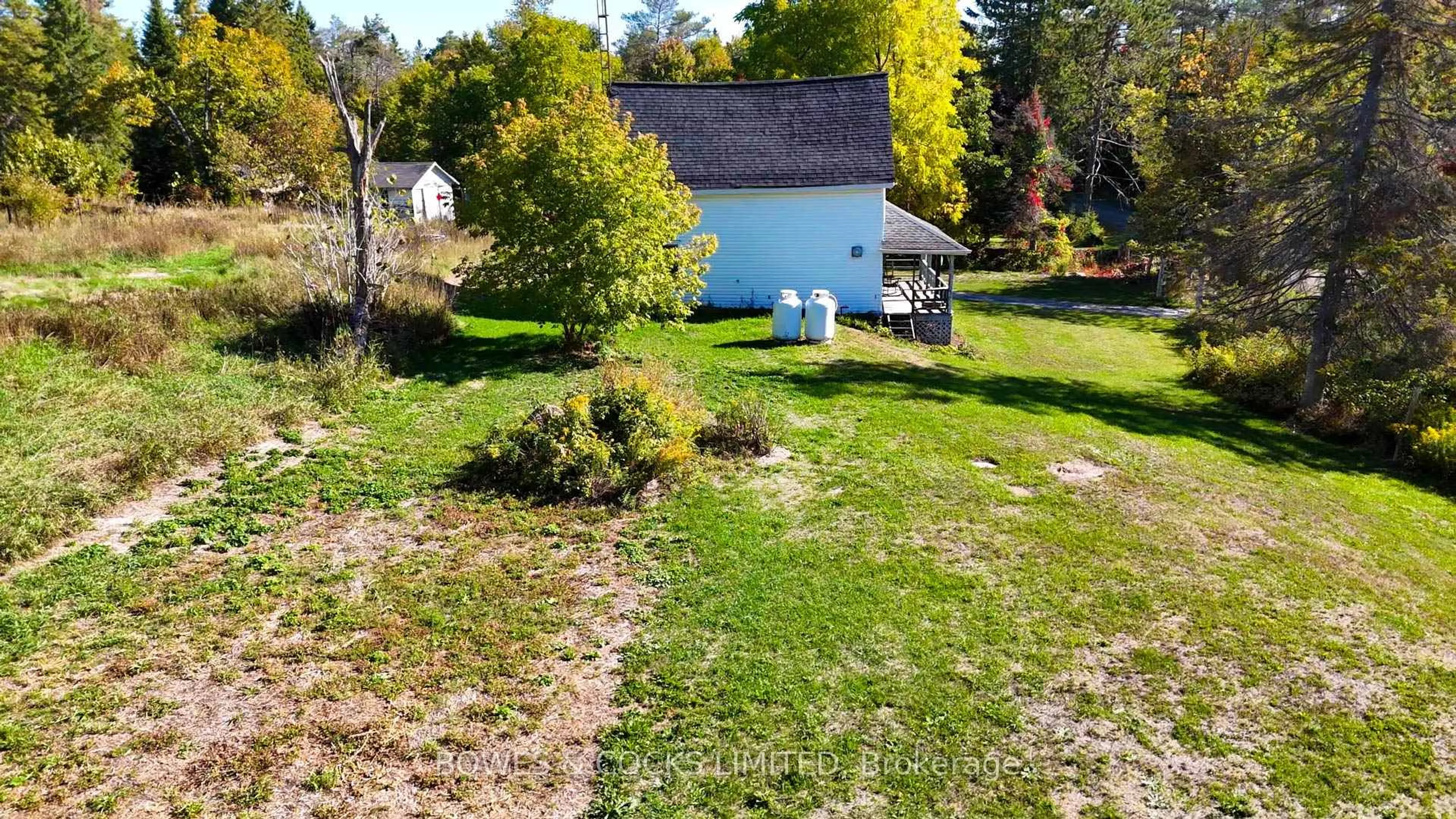 A pic from outside/outdoor area/front of a property/back of a property/a pic from drone, street for 68 Lasswade Rd, North Kawartha Ontario K0L 1A0