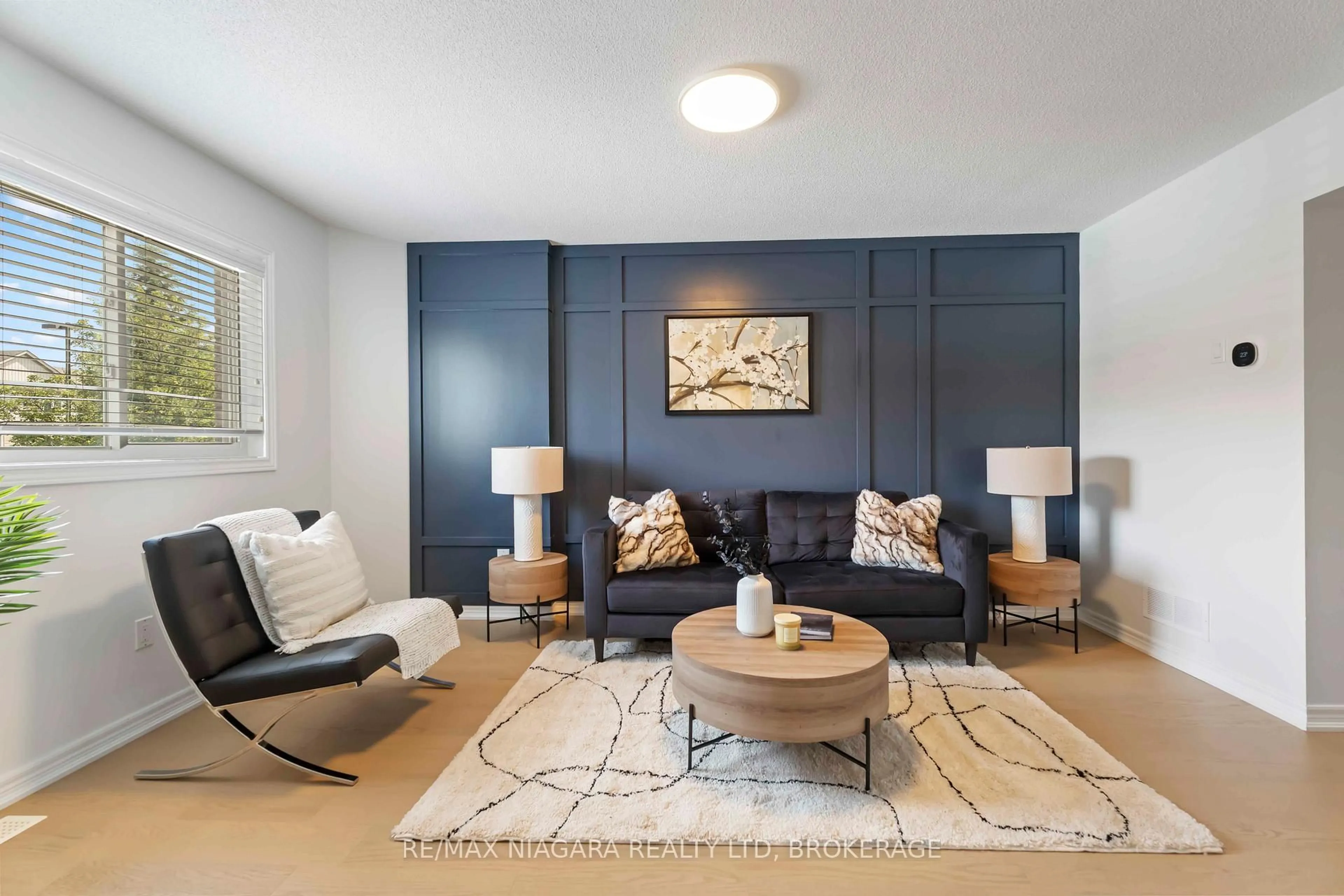 Living room with furniture, unknown for 6117 Kelsey Cres #10, Niagara Falls Ontario L2H 0L6