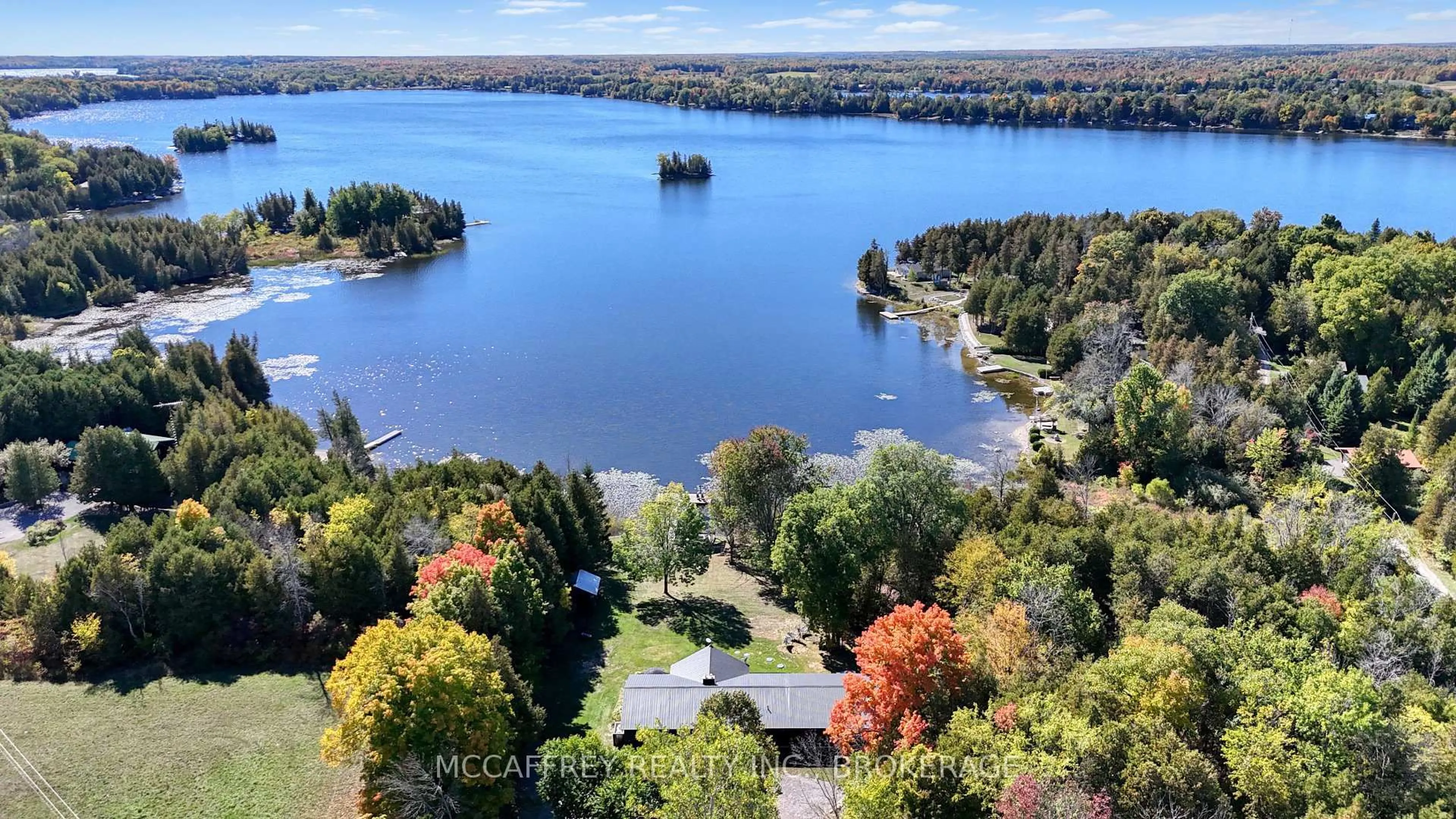 A pic from outside/outdoor area/front of a property/back of a property/a pic from drone, water/lake/river/ocean view for 98 Juniper Lane, Tamworth Ontario K0K 3G0