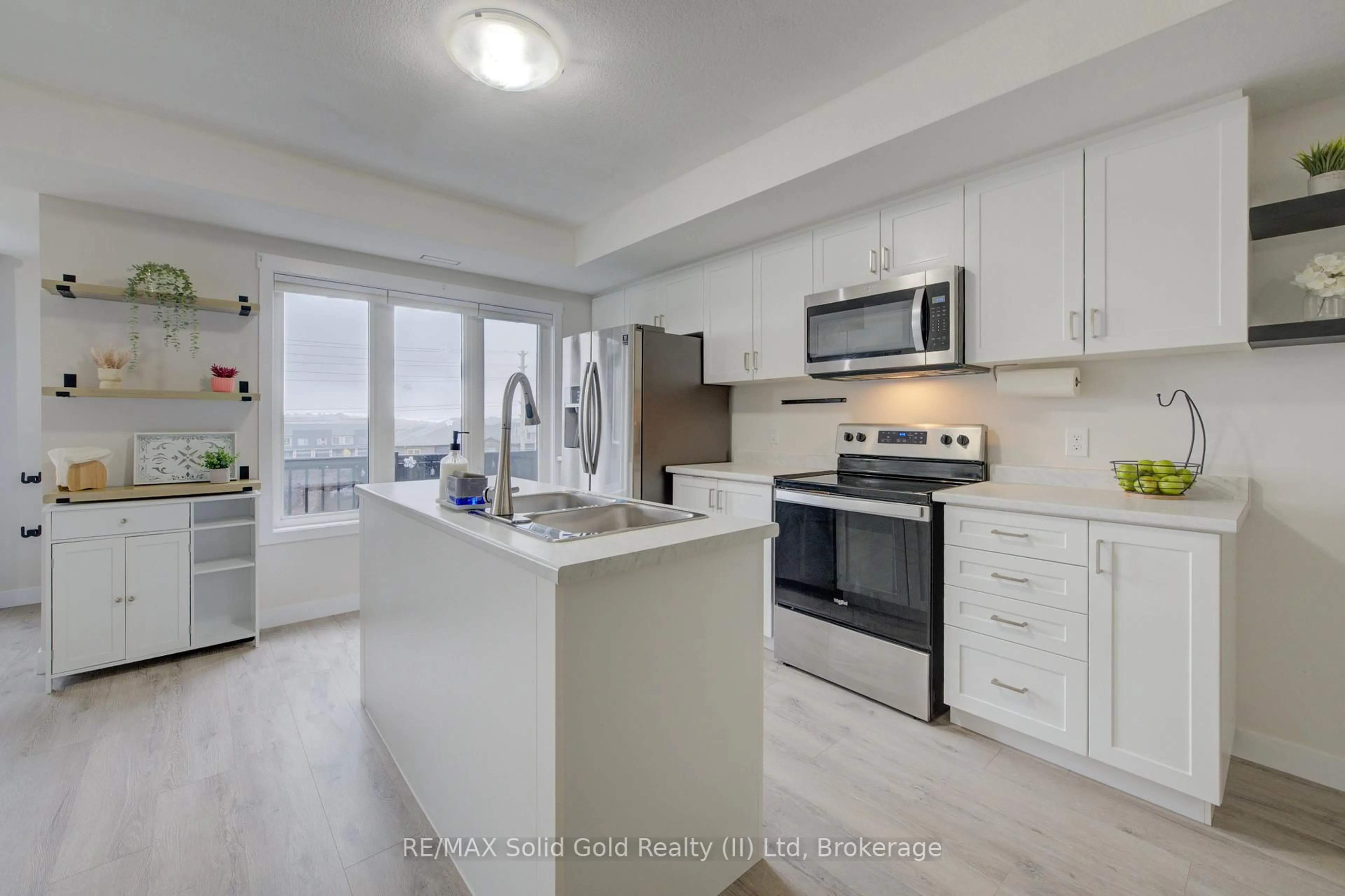 Open concept kitchen, ceramic/tile floor for 160 Rochefort St #A4, Kitchener Ontario N2R 0P5