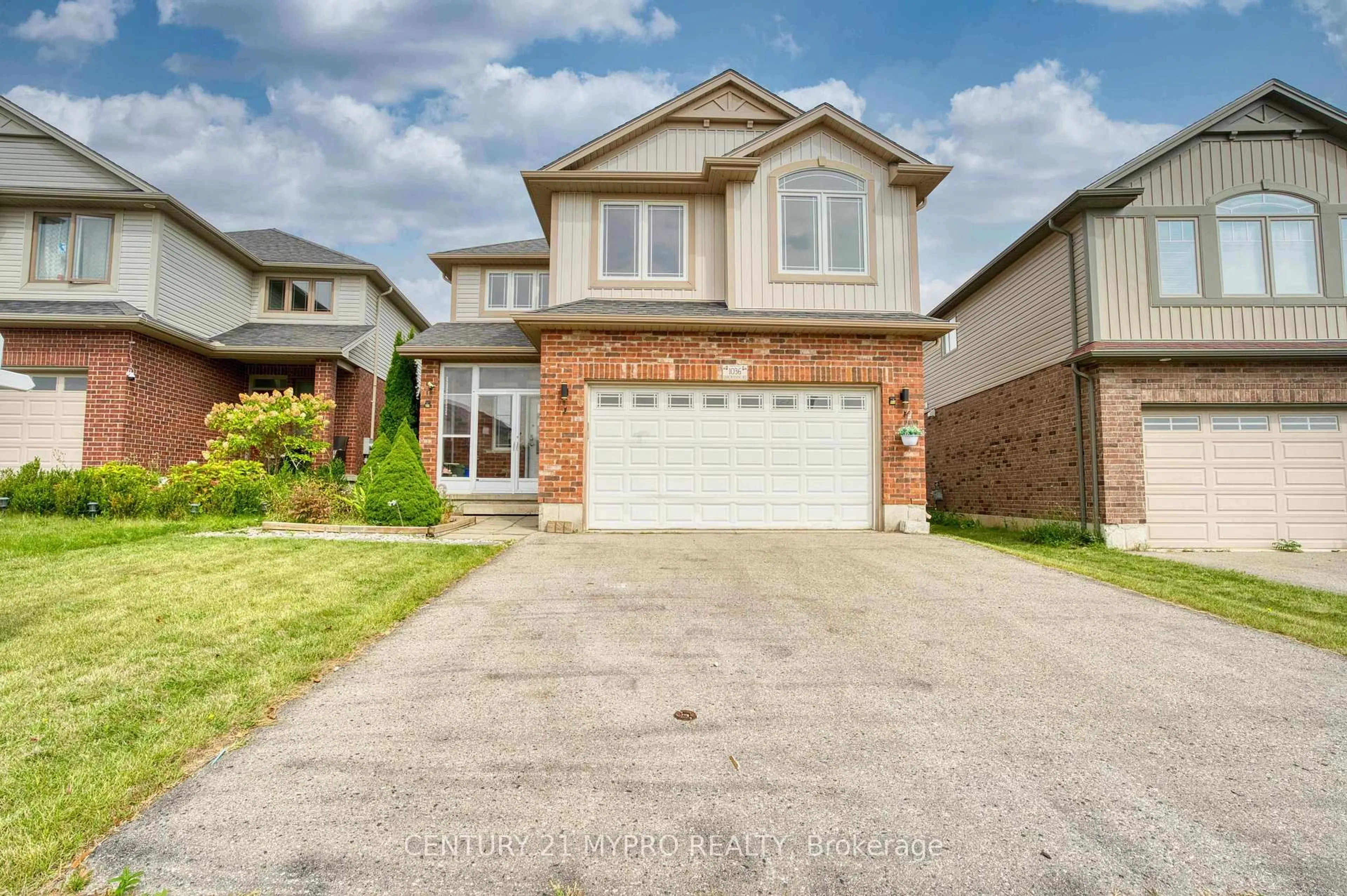 Home with brick exterior material, street for 1036 Oakcrossing Rd, London North Ontario N6H 0A8