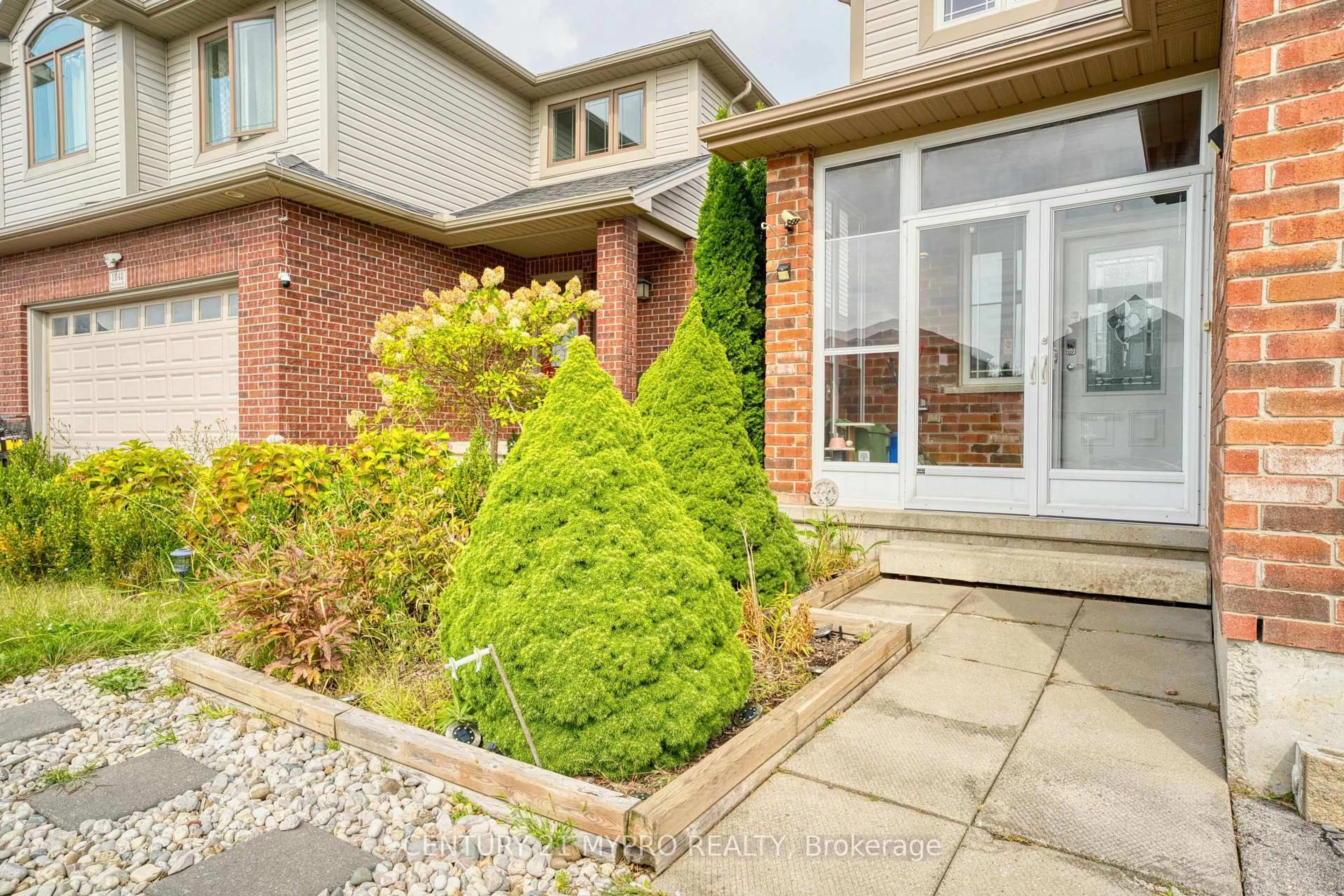 Home with brick exterior material, street for 1036 Oakcrossing Rd, London North Ontario N6H 0A8