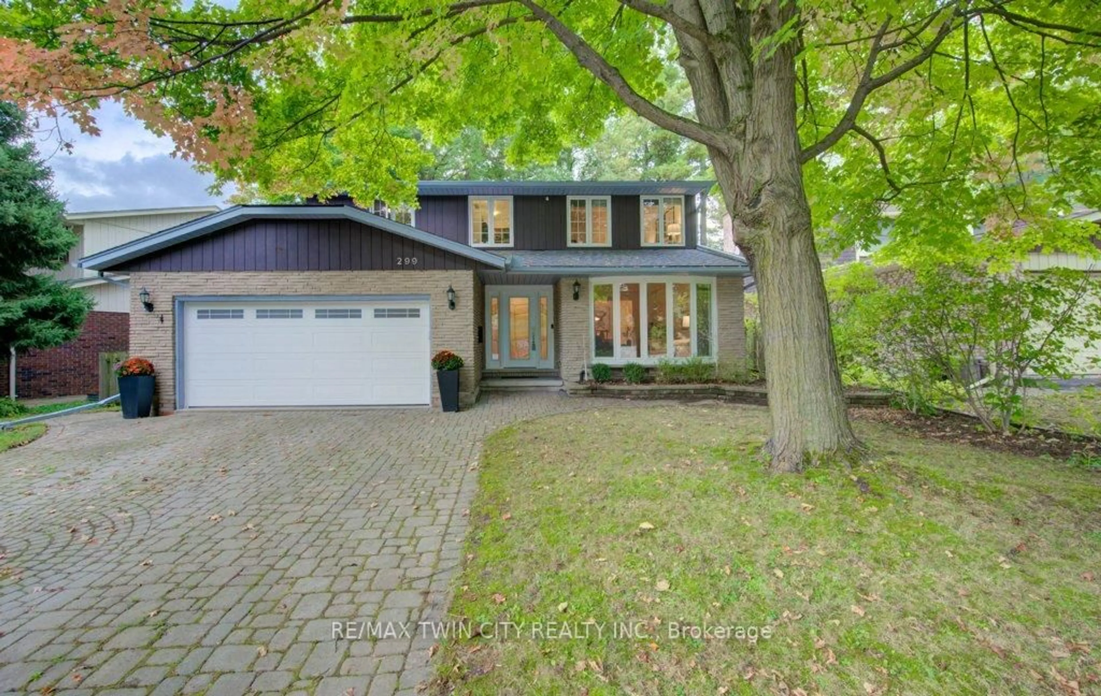 Home with vinyl exterior material, street for 299 Hiawatha Dr, Waterloo Ontario N2L 2V9