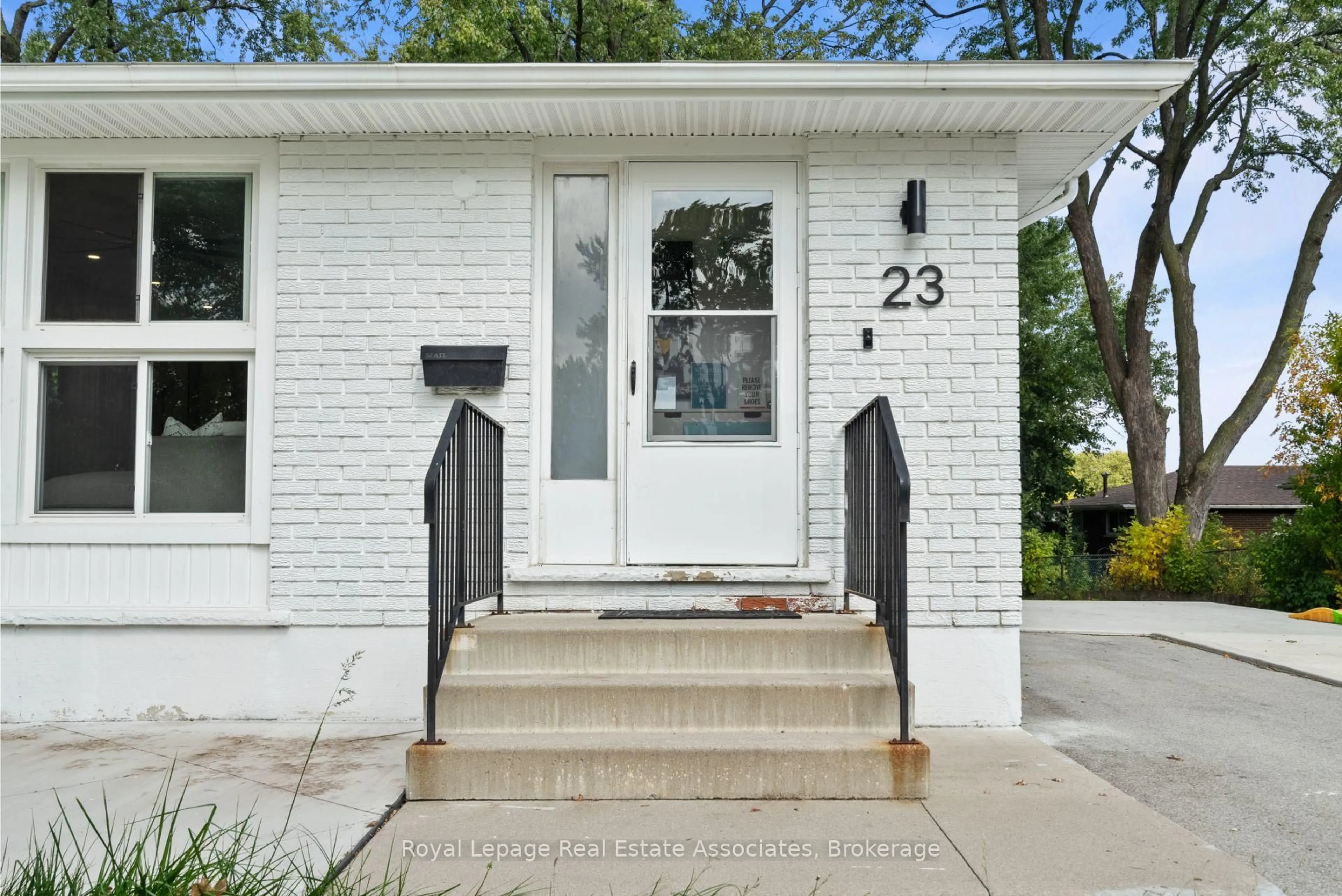Home with brick exterior material, street for 23 Thorley Dr, Hamilton Ontario L8T 2Y9