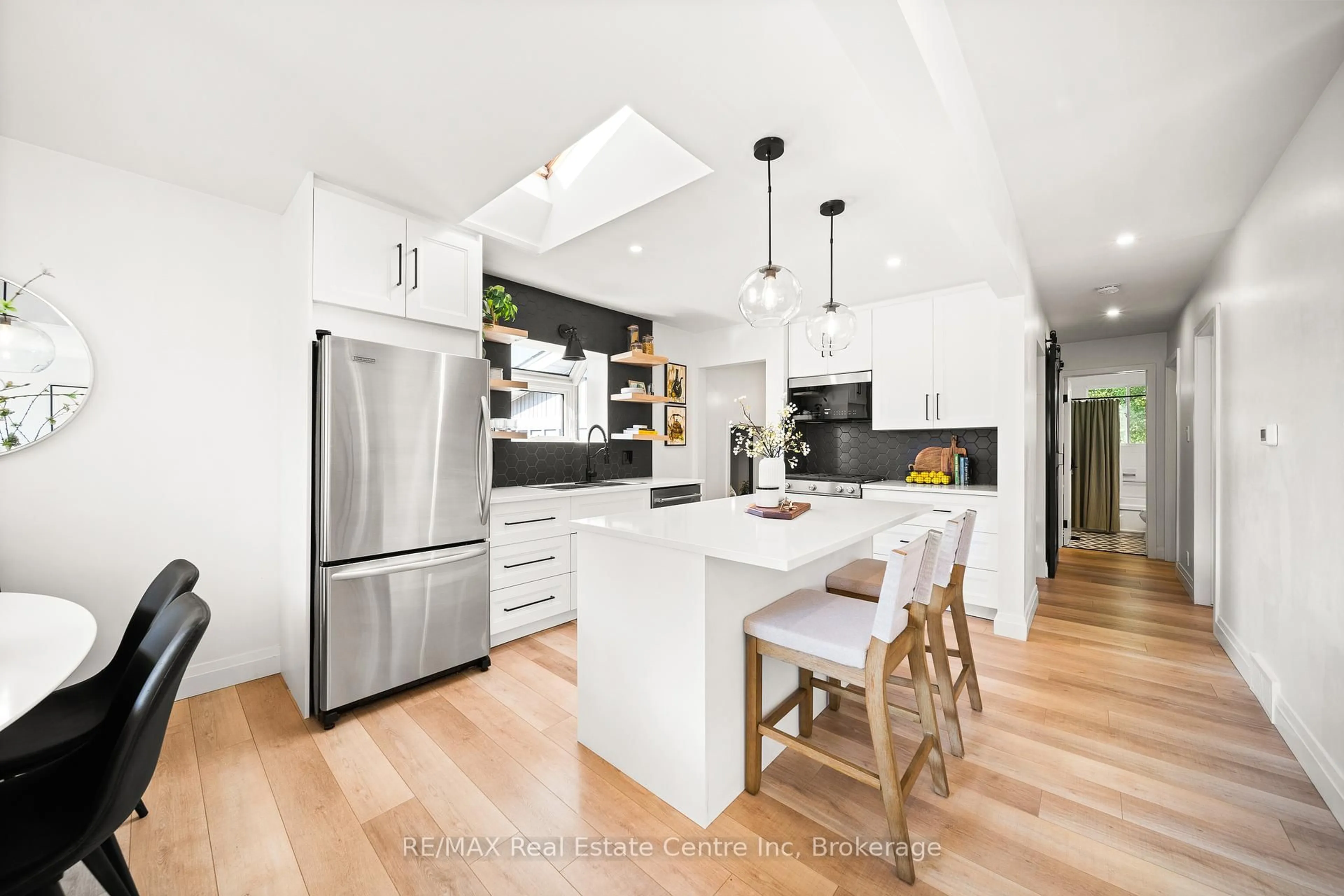 Contemporary kitchen, wood/laminate floor for 51 Muskoka Dr, Guelph Ontario N1E 3M8