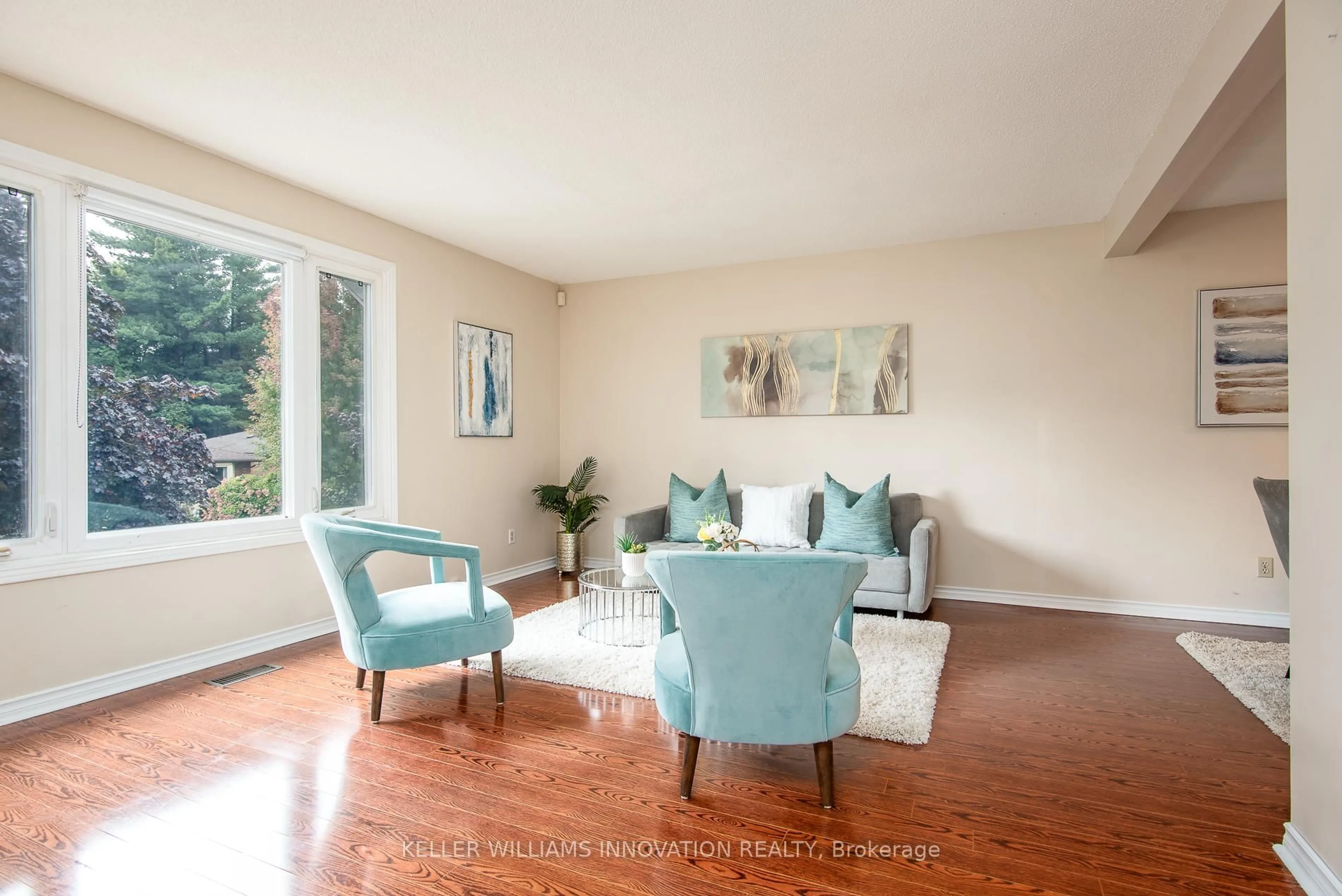 Living room with furniture, wood/laminate floor for 64 Sabrina Cres, Kitchener Ontario N2P 1Y6