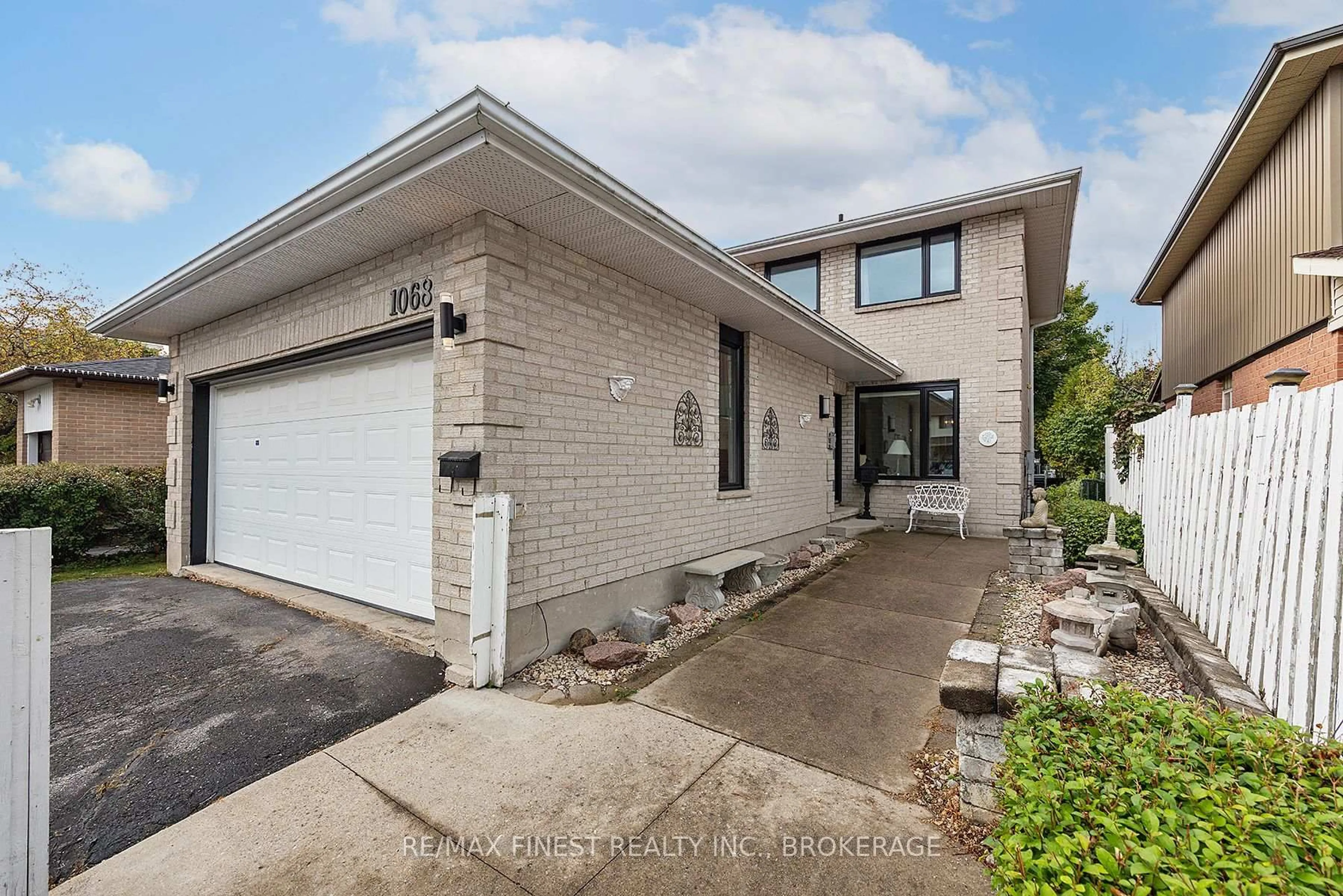 Home with brick exterior material, street for 1068 Willowood Dr, Kingston Ontario K7P 1Z3
