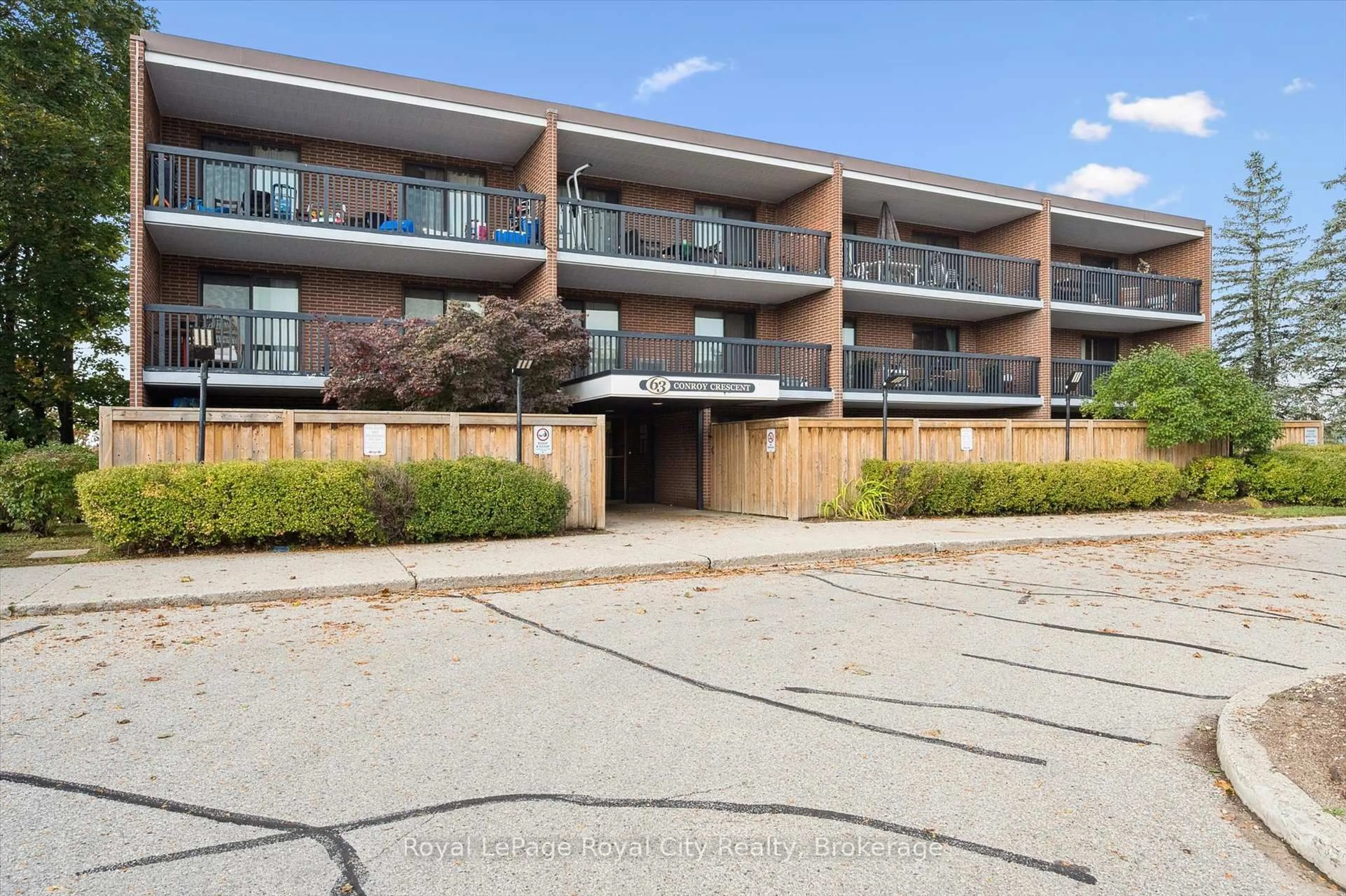A pic from outside/outdoor area/front of a property/back of a property/a pic from drone, building for 63 Conroy Cres #24, Guelph Ontario N1G 2V5