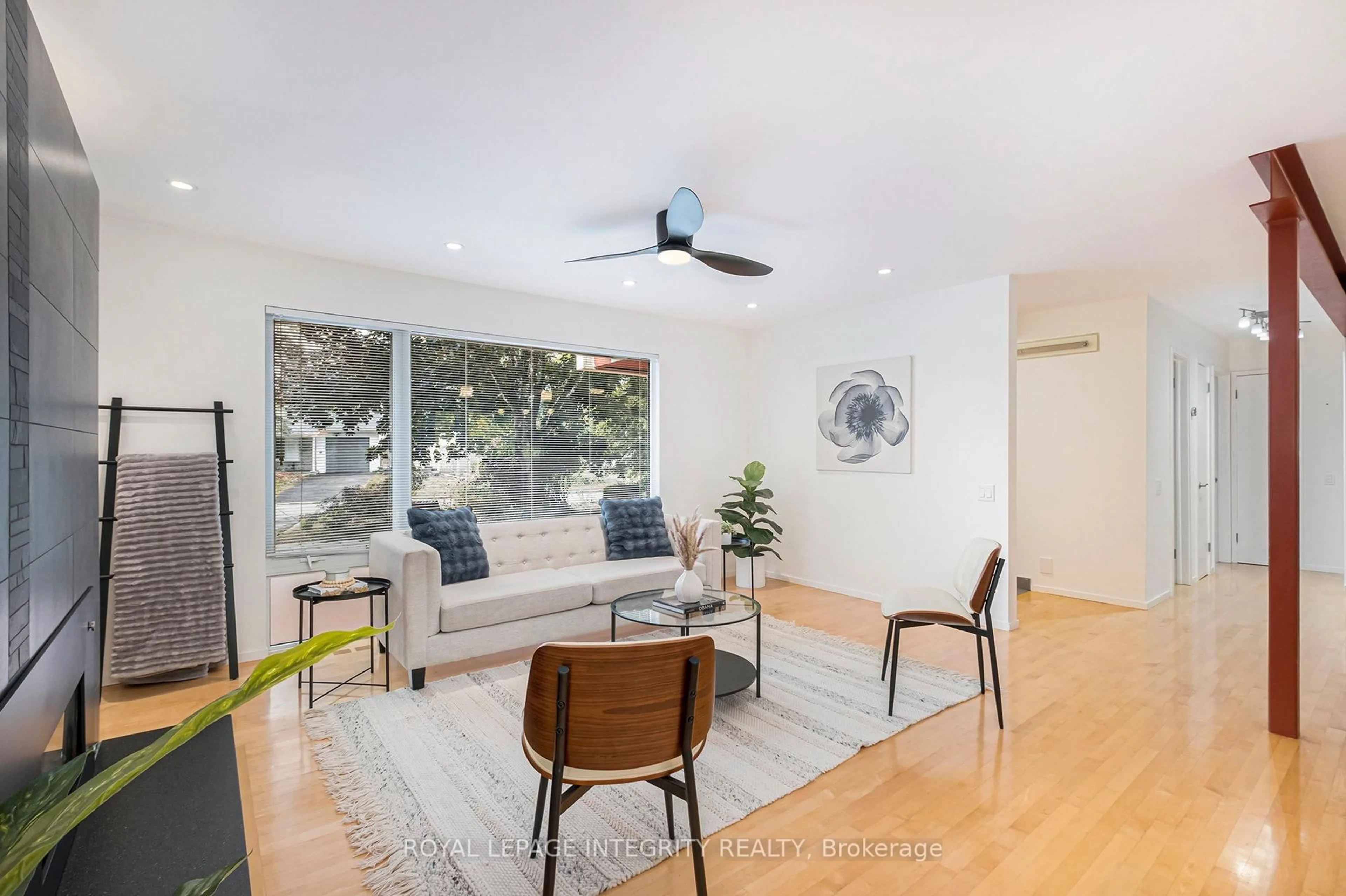 Living room with furniture, wood/laminate floor for 23 Still Water Dr, Ottawa Ontario K2H 5J9