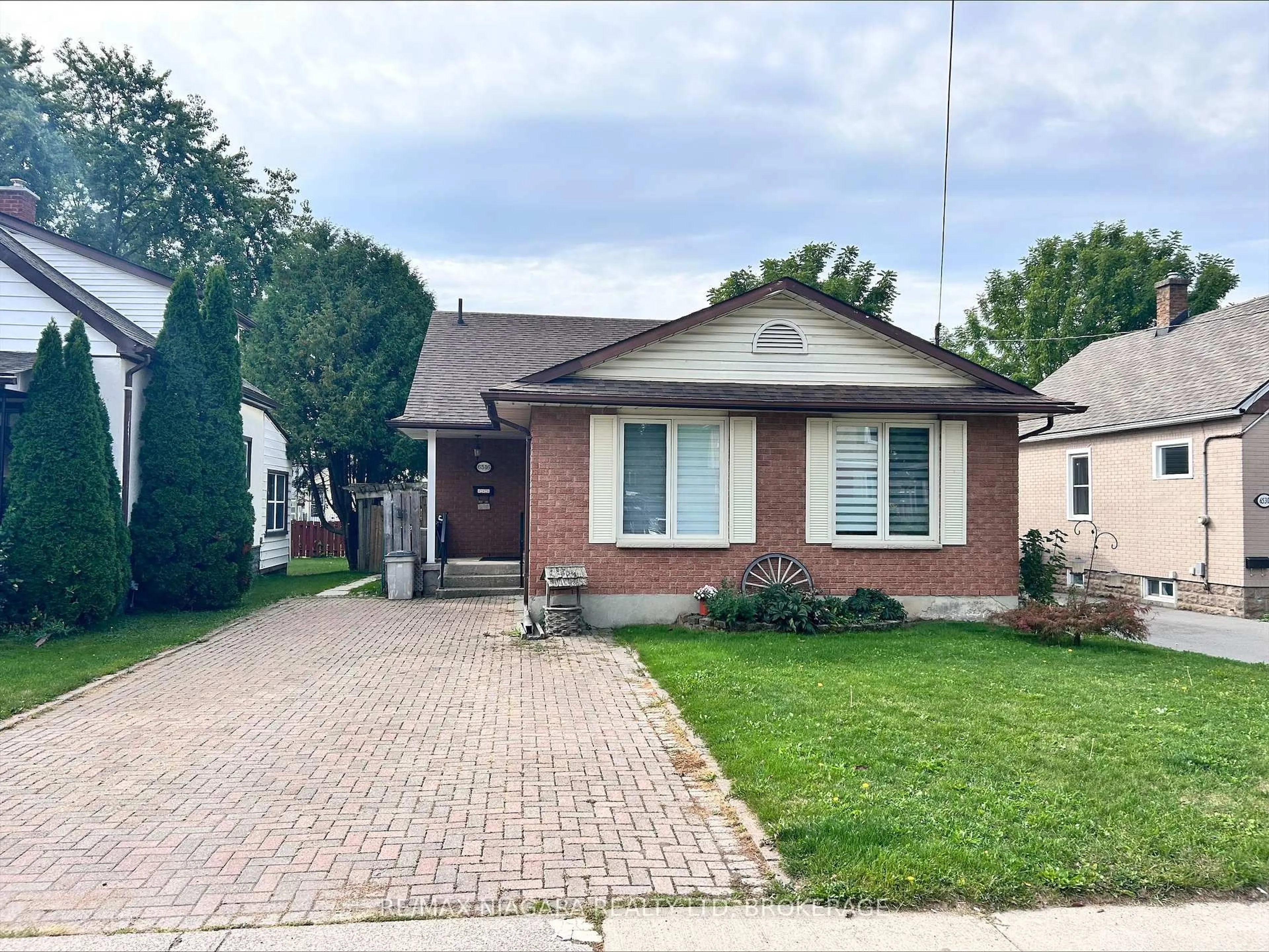 Home with brick exterior material, street for 6516 Monroe St, Niagara Falls Ontario L2G 2G8