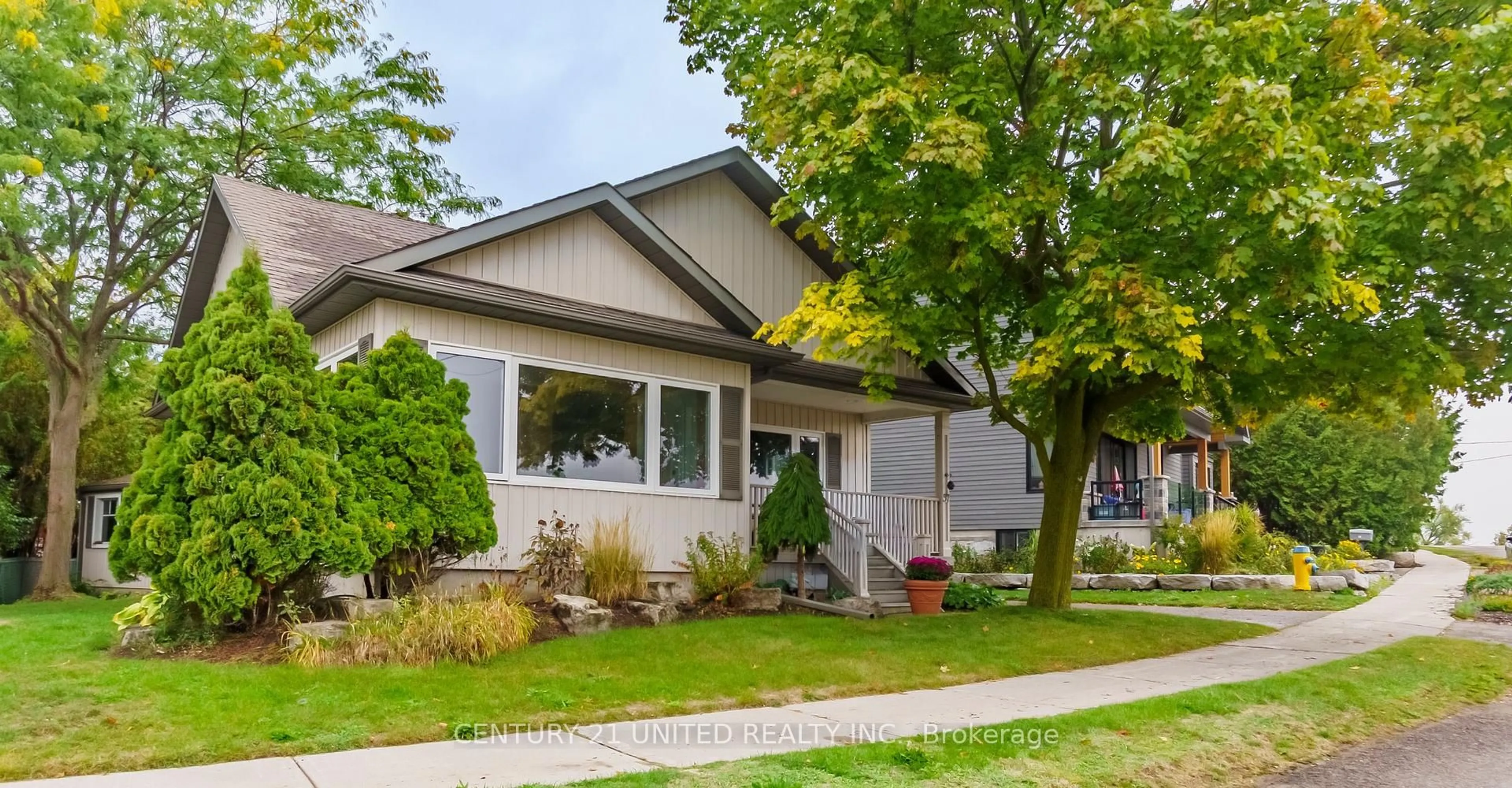 Home with vinyl exterior material, street for 57 Edgewater Blvd, Peterborough Ontario K9H 1A4