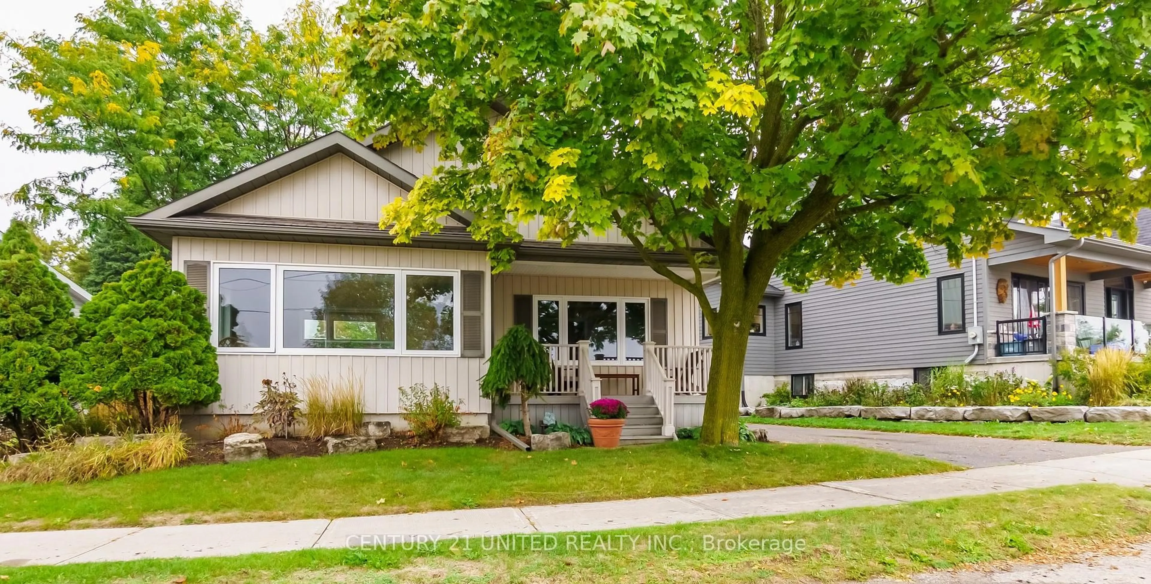 Home with vinyl exterior material, street for 57 Edgewater Blvd, Peterborough Ontario K9H 1A4