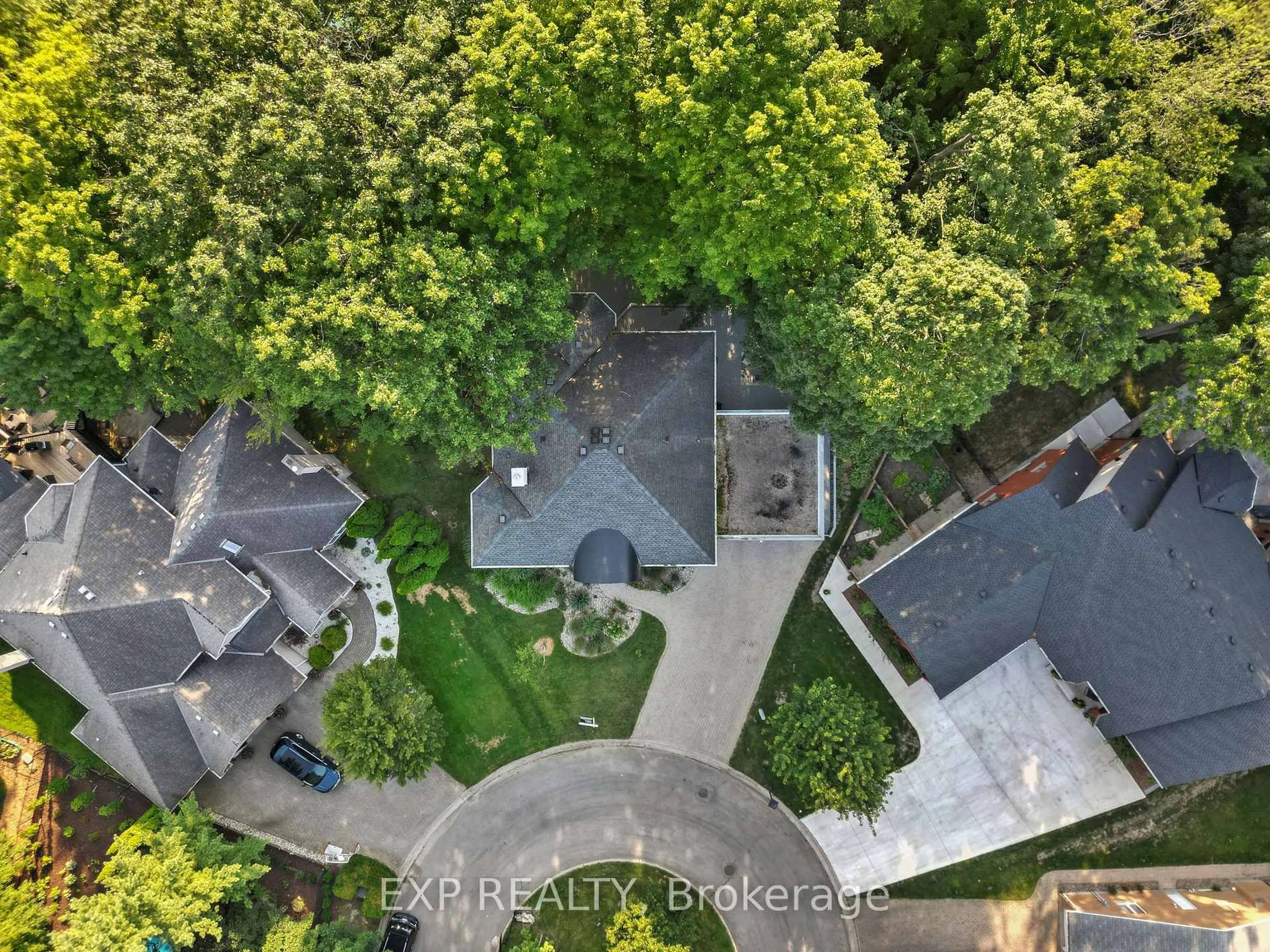 A pic from outside/outdoor area/front of a property/back of a property/a pic from drone, forest/trees view for 52 Birchmount Walk, London South Ontario N6K 4K5