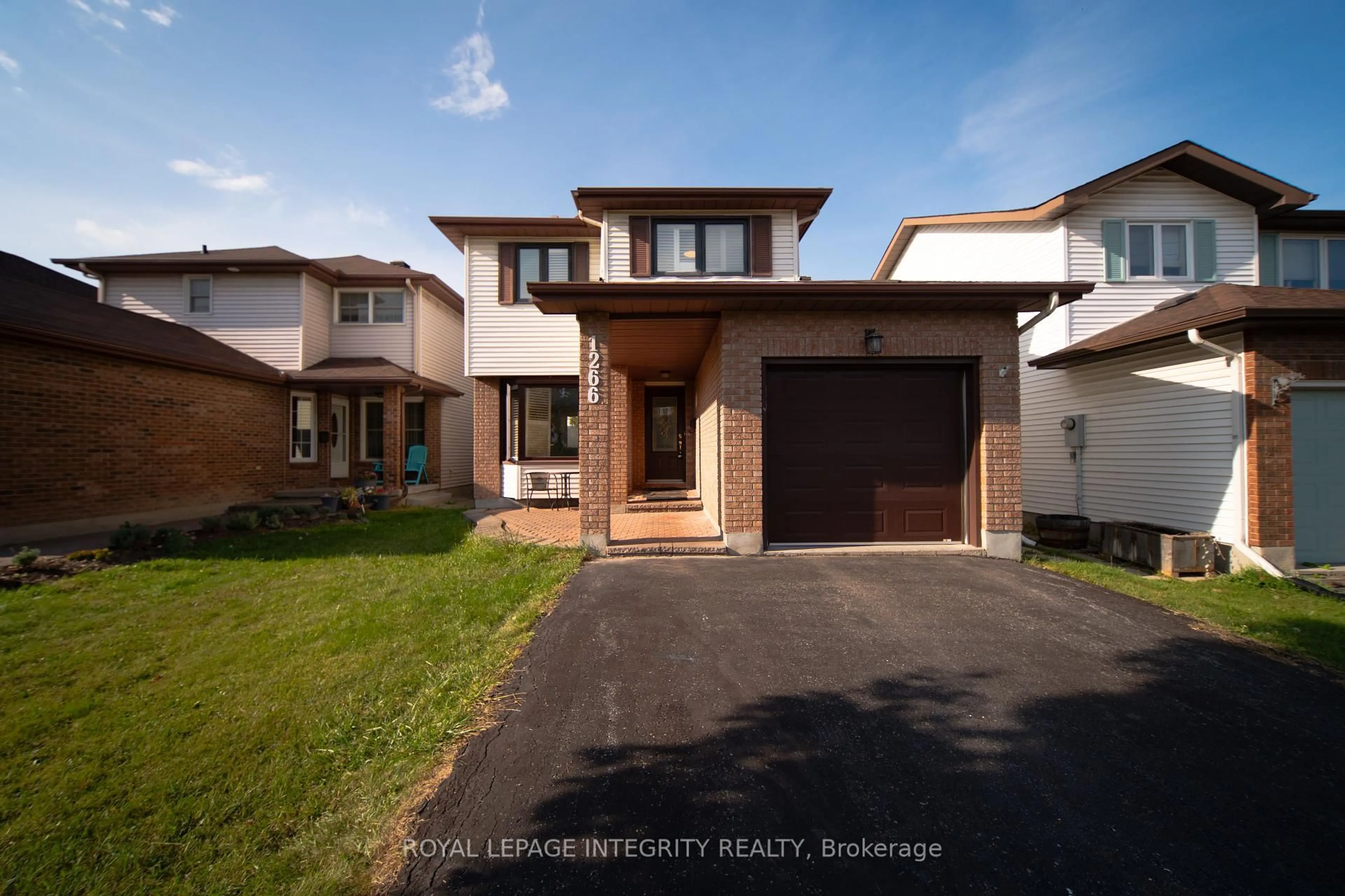 Home with brick exterior material, street for 1266 Famlit Crt, Ottawa Ontario K1J 9A2