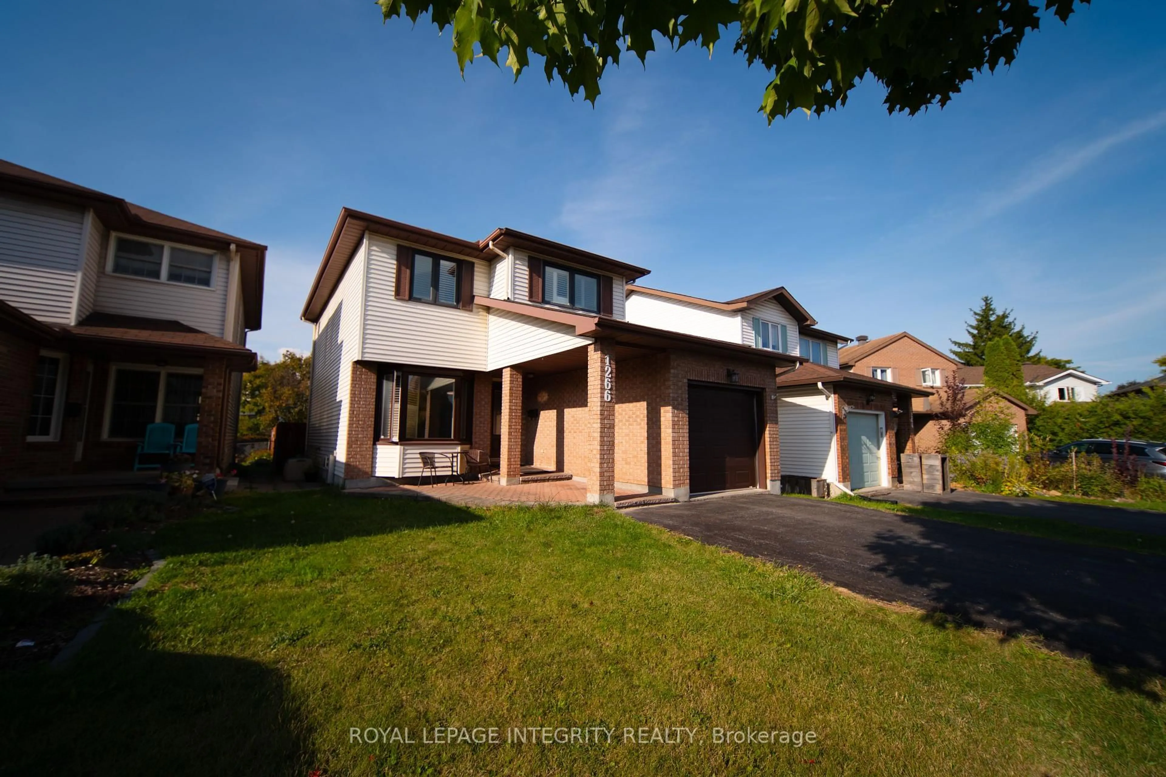 Home with brick exterior material, street for 1266 Famlit Crt, Ottawa Ontario K1J 9A2