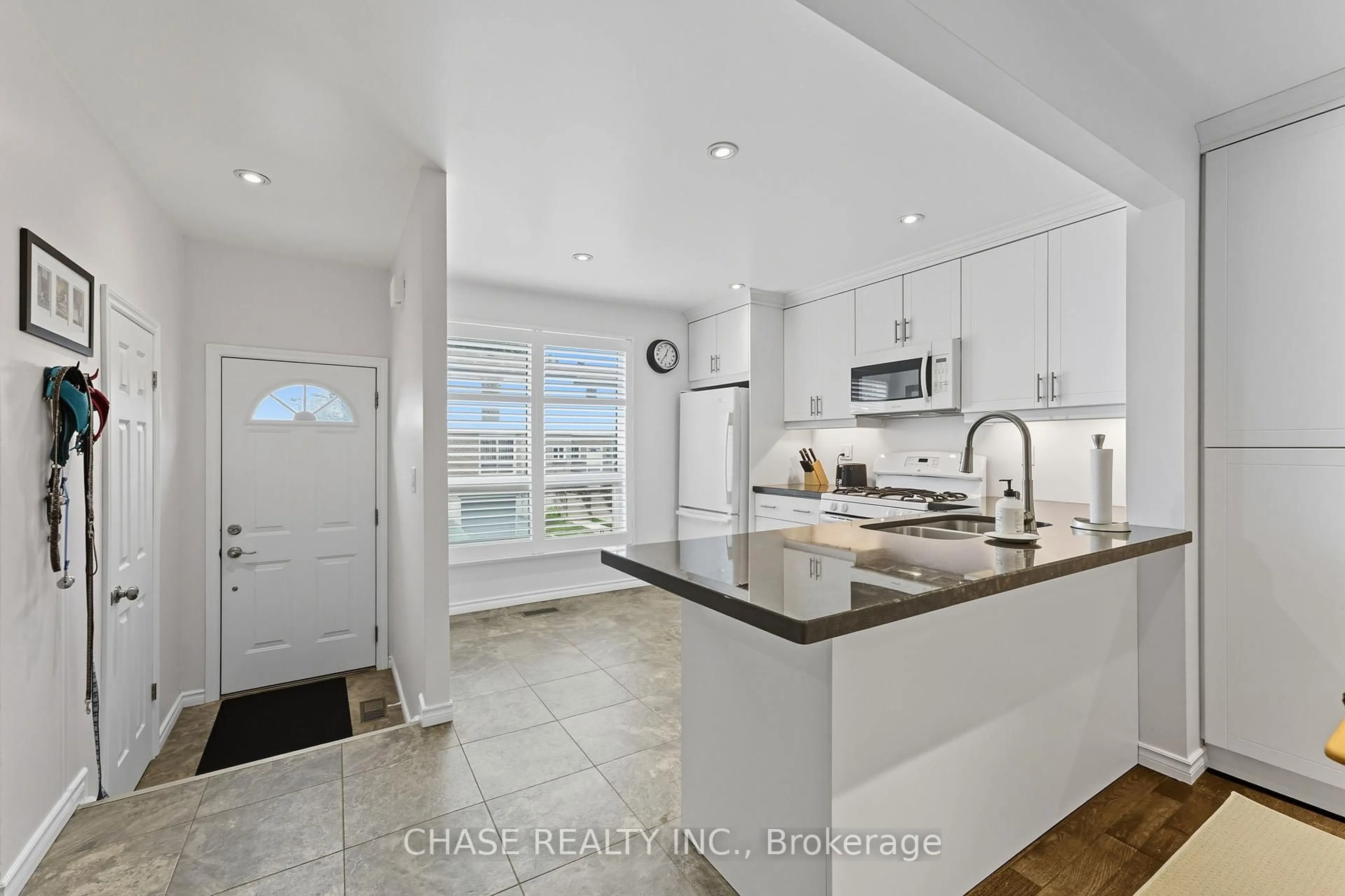 Open concept kitchen, ceramic/tile floor for 1301 Upper Gage Ave #34, Hamilton Ontario L8W 1E5