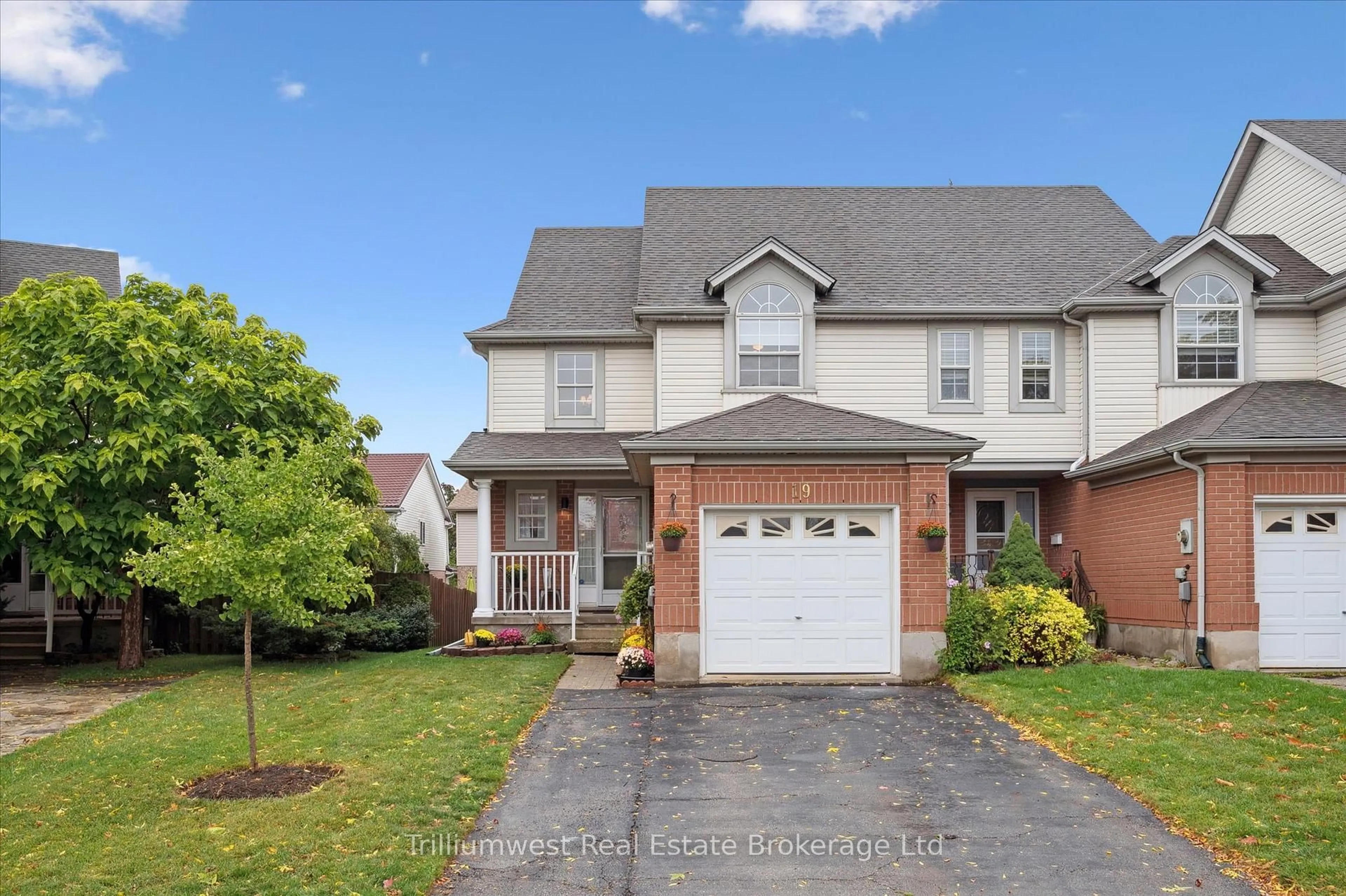 Home with brick exterior material, street for 19 Ireland Pl, Guelph Ontario N1E 7C2